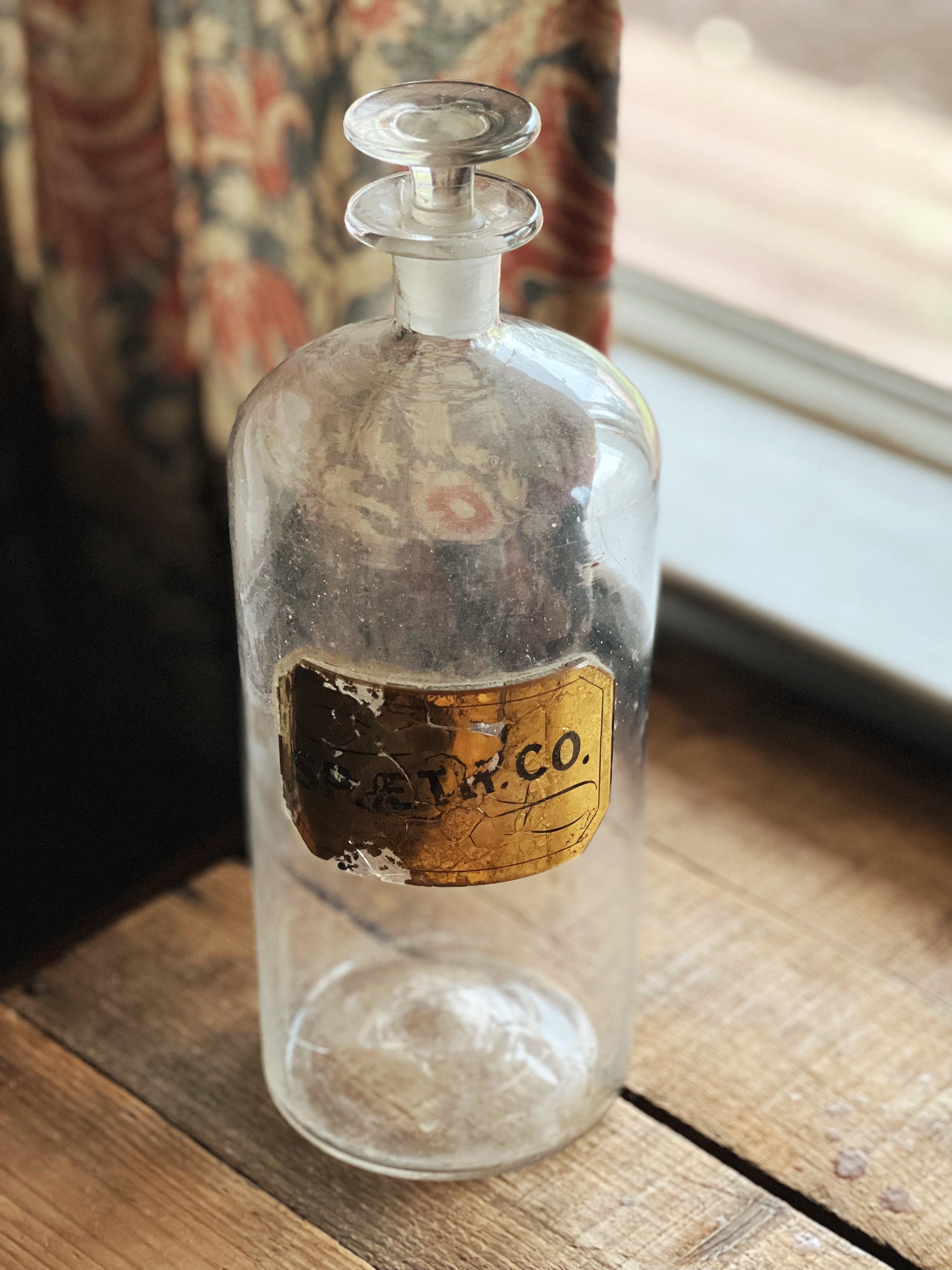 gold label apothecary bottle