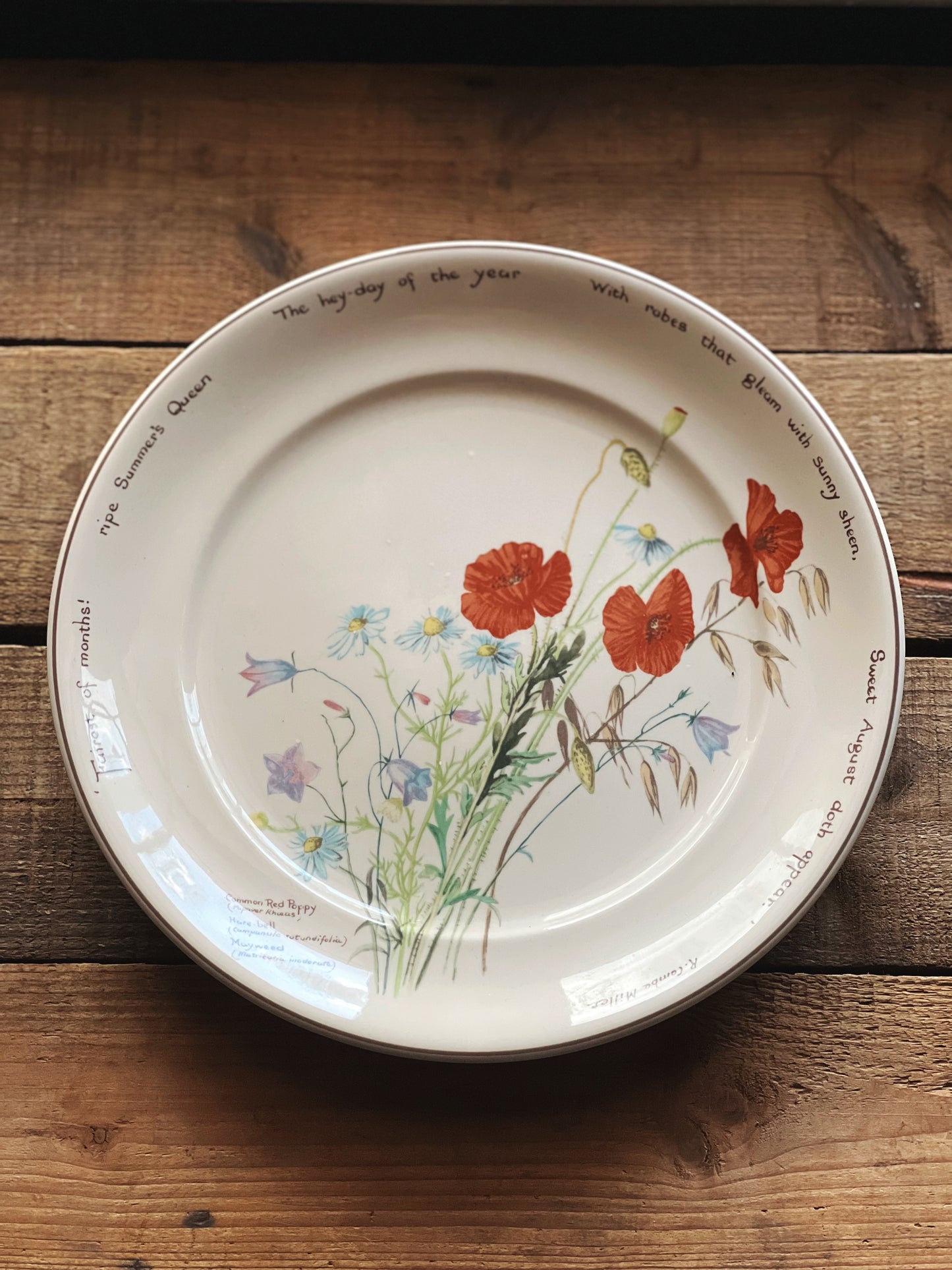 floral dinner plate with a poem around the outer rim