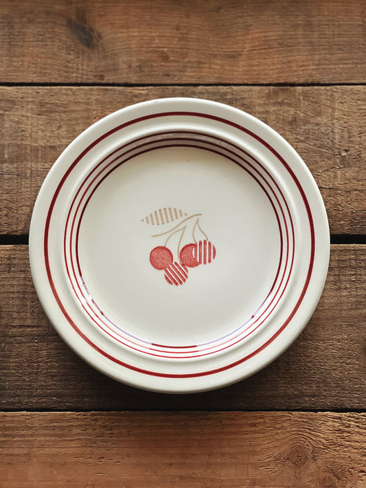 cherry pattern plates with a red striped rim