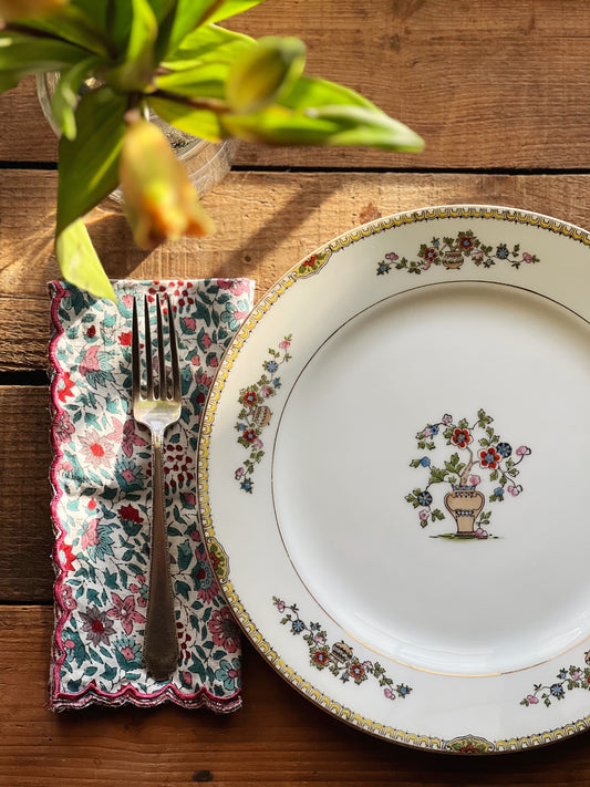 turquoise and pink block print napkins with a chinoiserie dinner plate