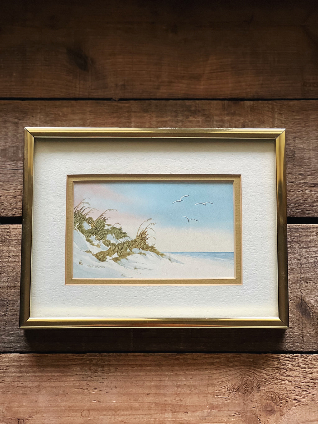 Signed Midge Thomas Sand Dune Watercolor on a rustic wood surface
