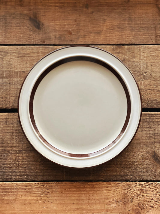 brown and white stoneware salad plate