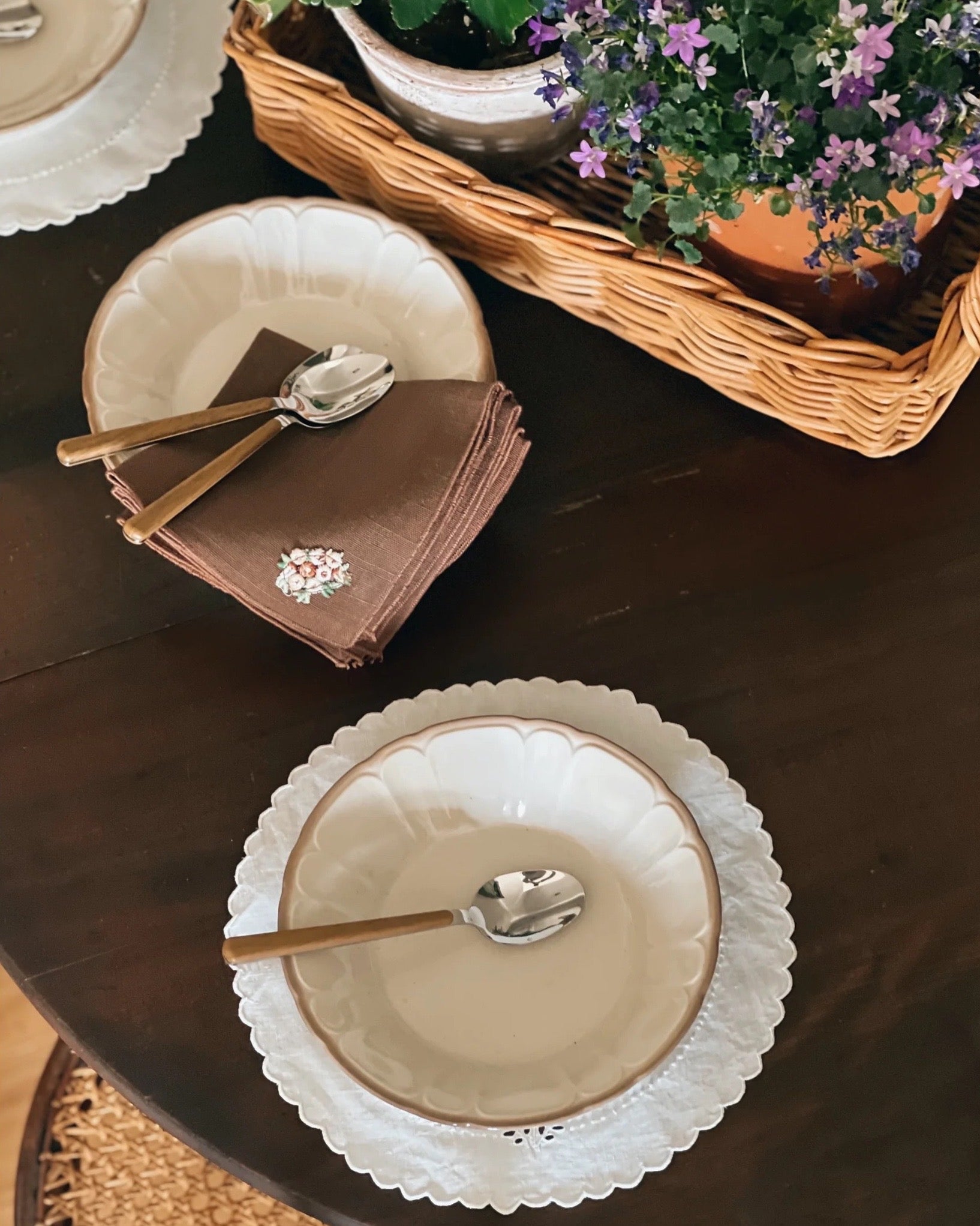 Vintage cocktail napkins in chocolate brown with an embroidered floral design