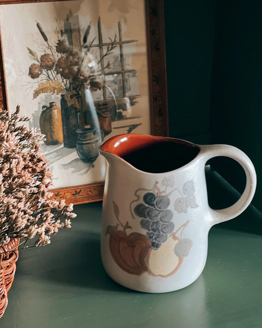 vintage stoneware pitcher with hand painted fruit design