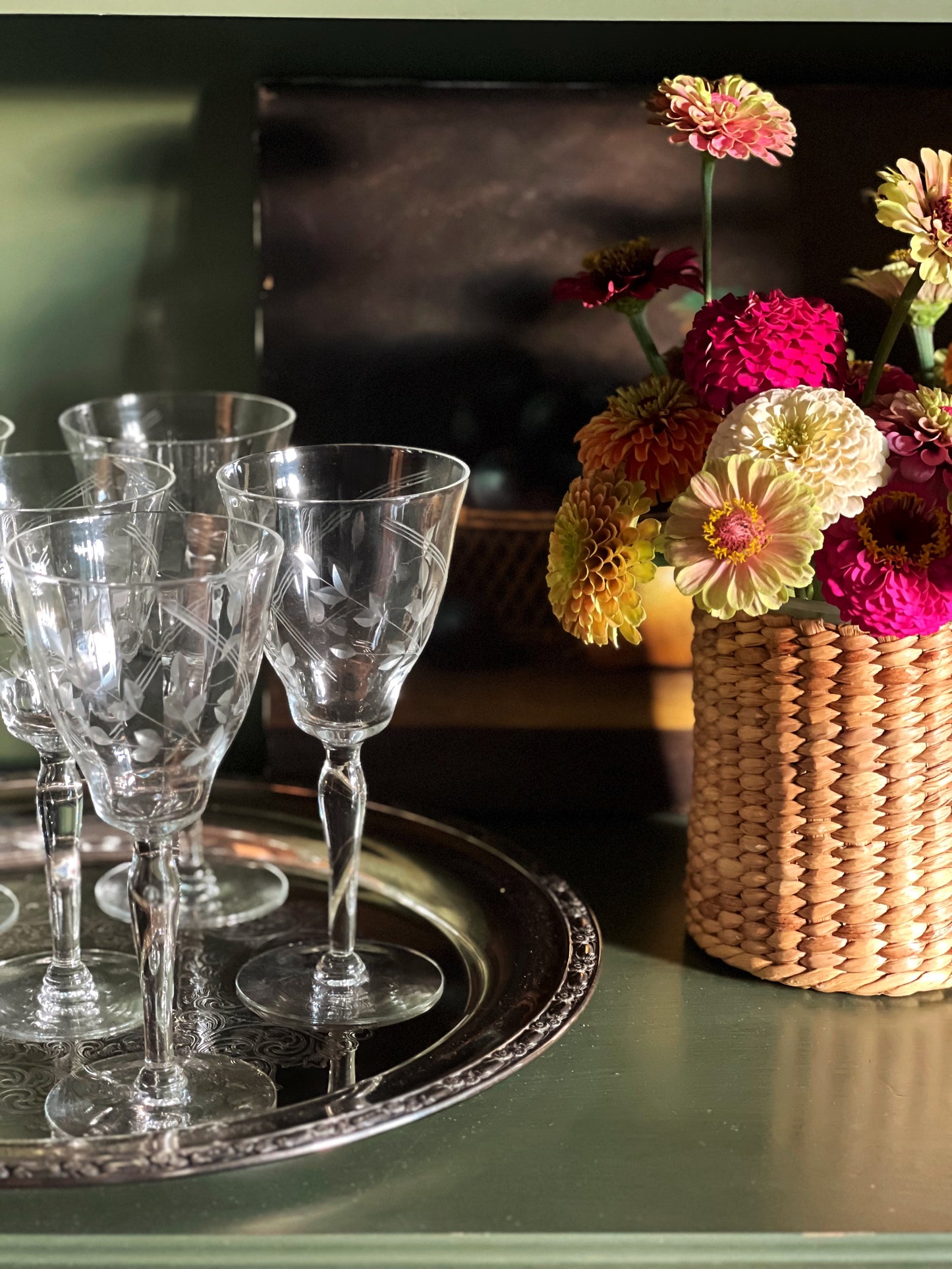 vintage etched wine glasses featured on a round silver serving tray