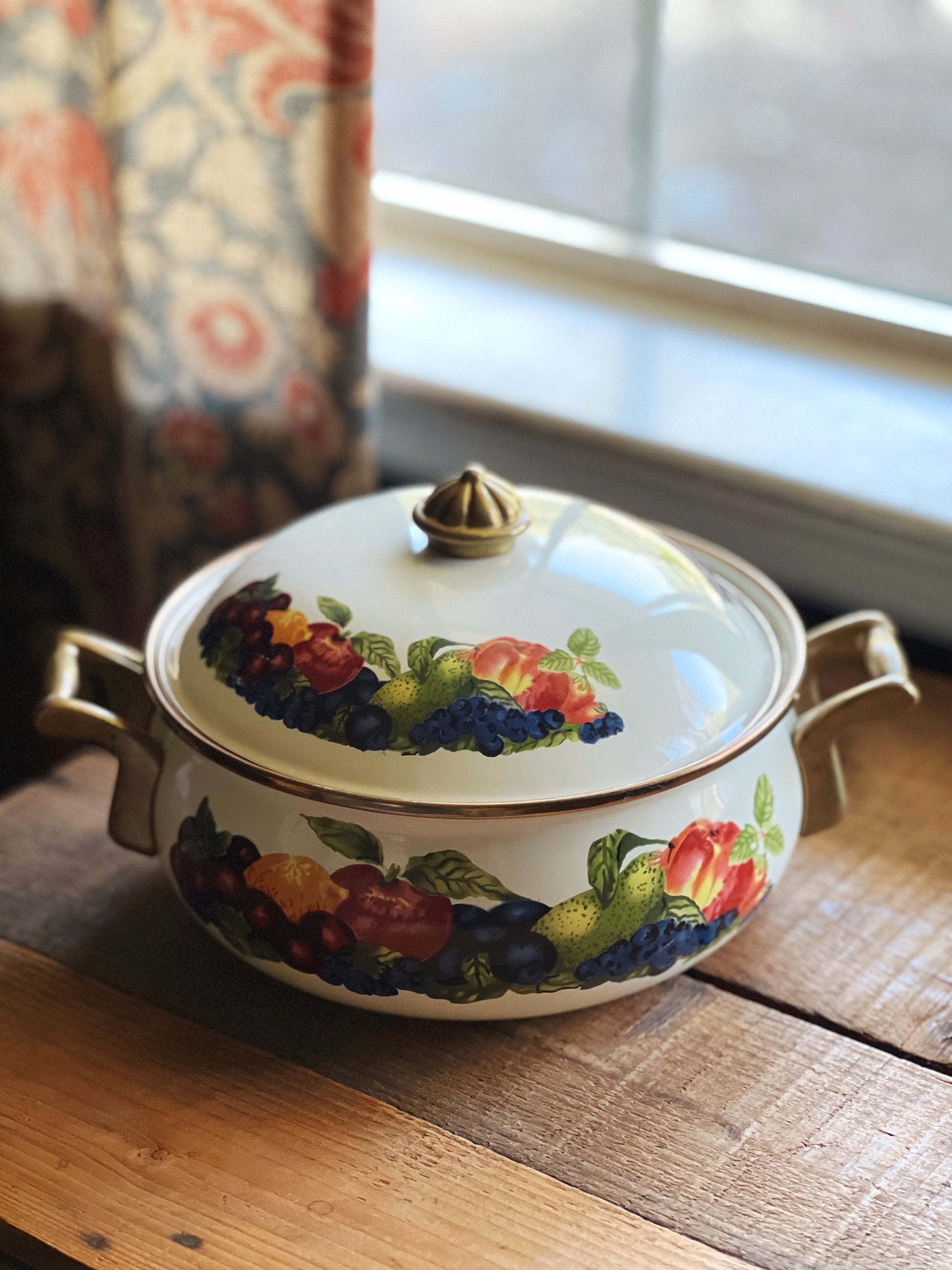 Vintage dutch oven with a floral pattern