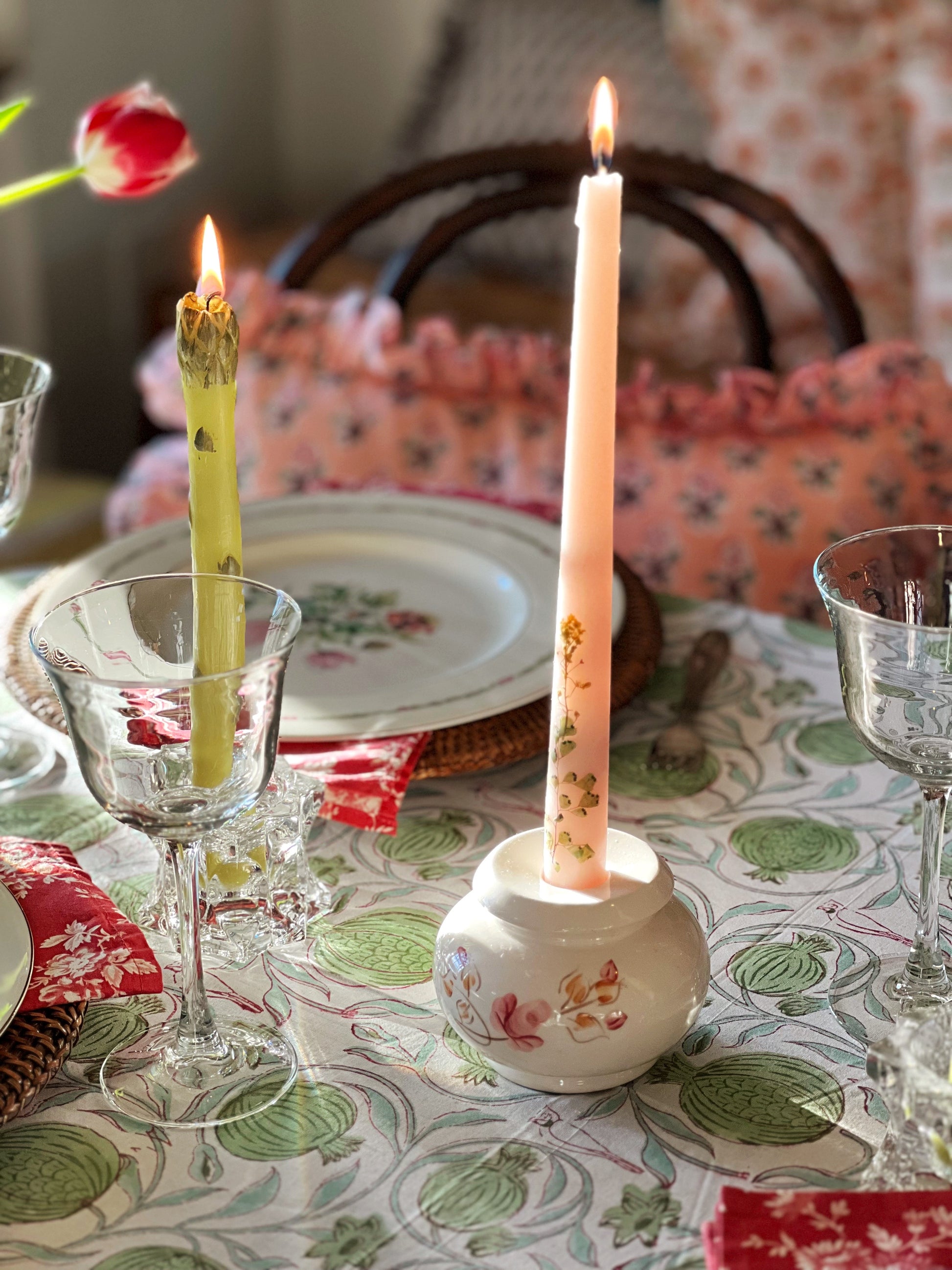 pink floral ceramic candleholder set on a spring table