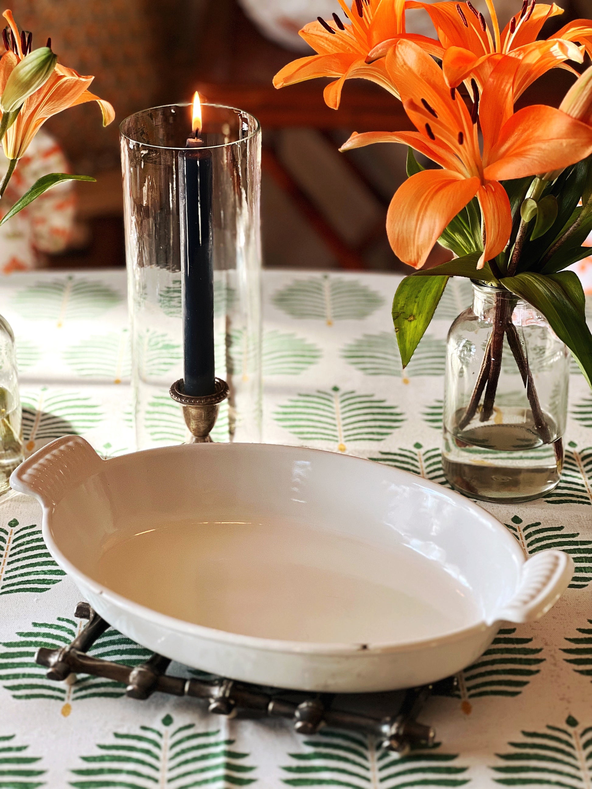 white cast iron enamel casserole dish on a table