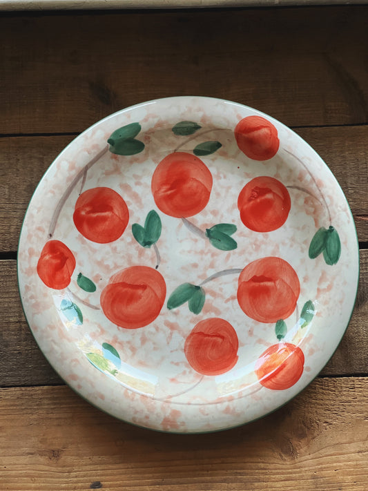 hand painted ceramic dinner plate with a peach design