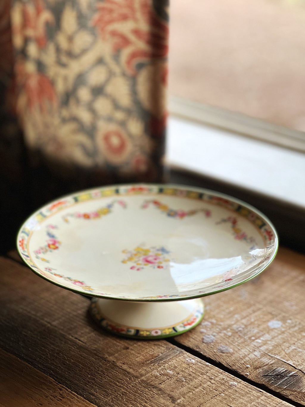 Minton cake stand with a multicolor floral pattern