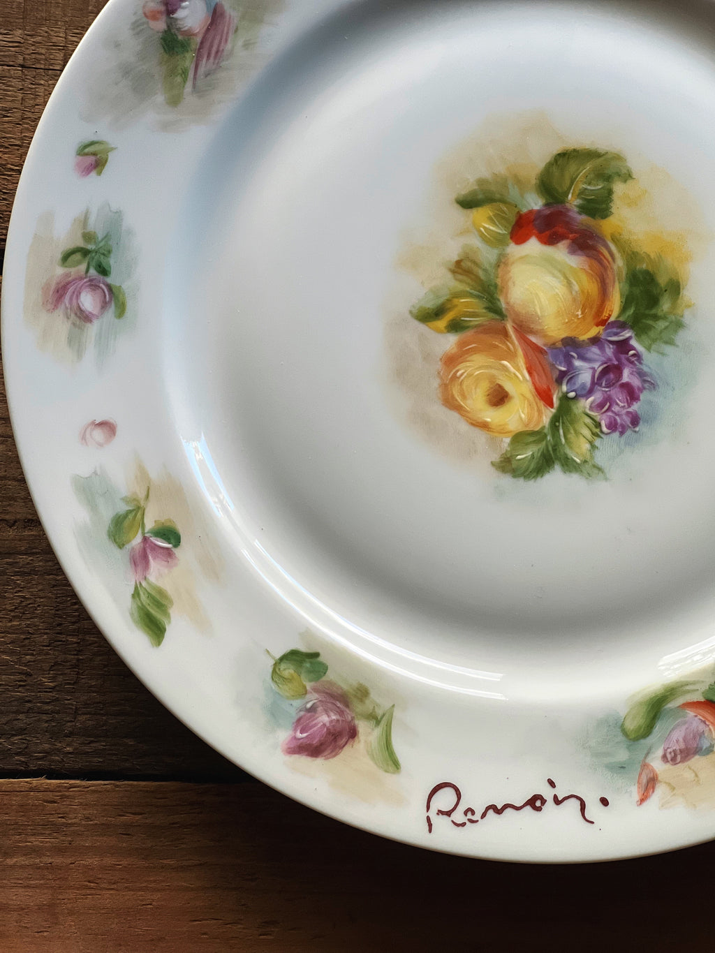 detail of hand painted Renoir pattern on vintage Limoges salad plate
