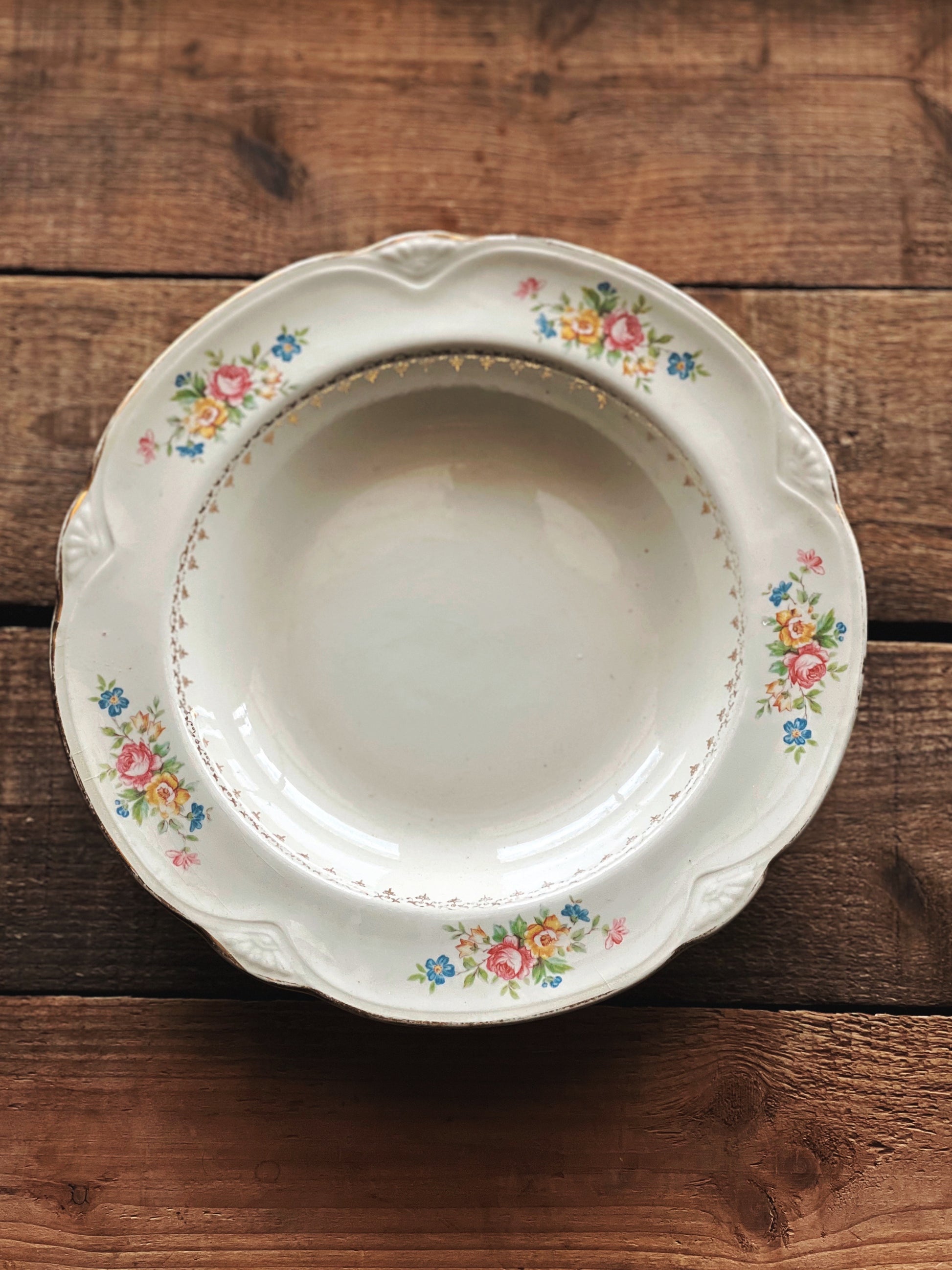 pink blue and green rimmed soup bowl