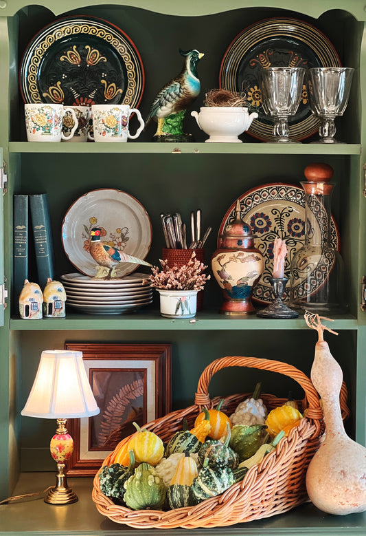 vintage wicker garden trug filled with gourds