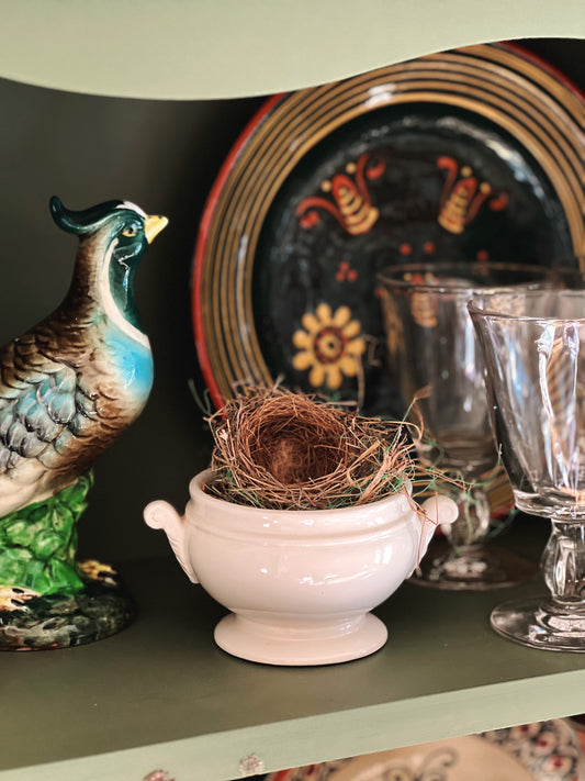 vintage bowl with bird's nest