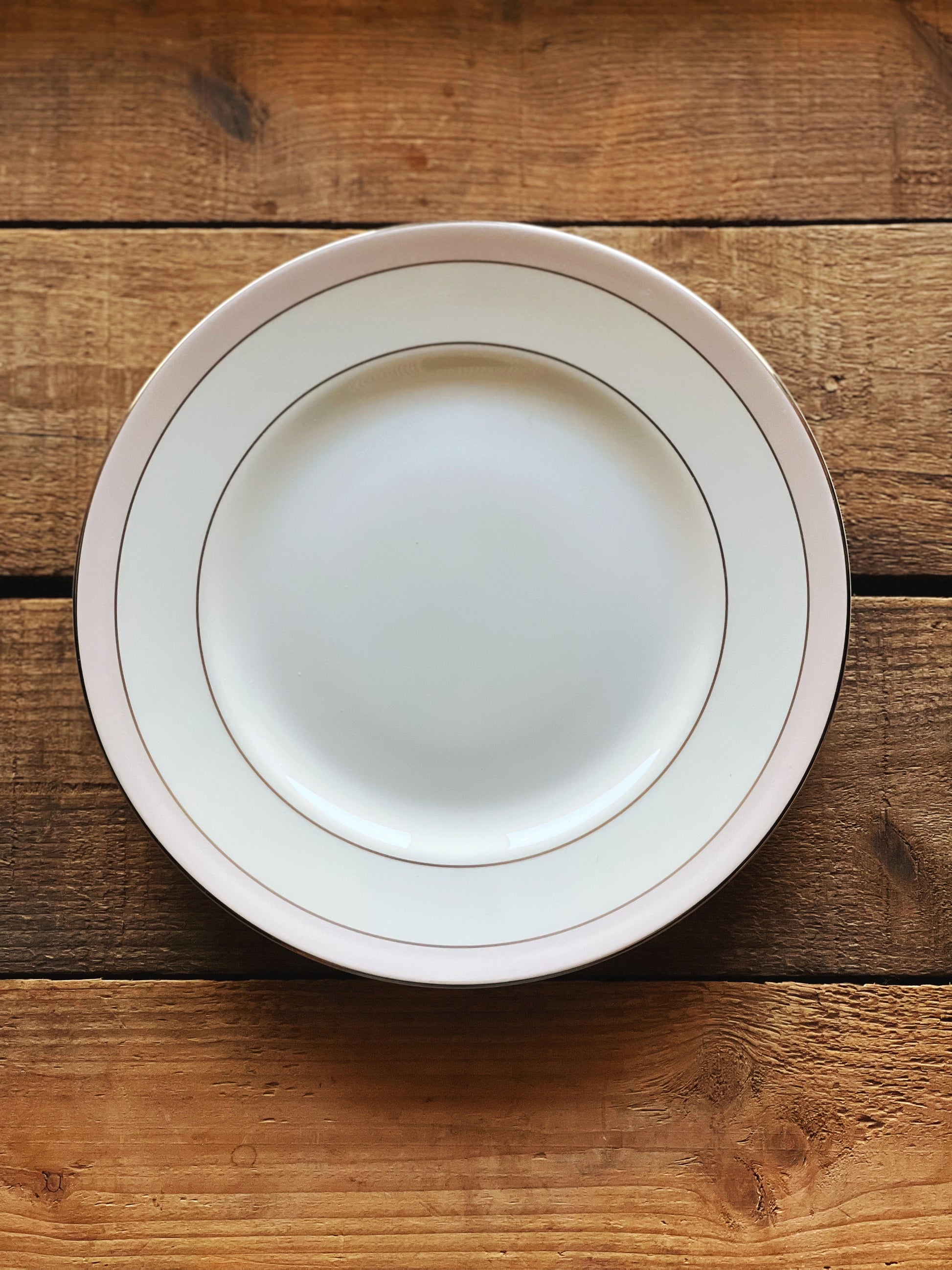 pink banded salad plate with a platinum rim