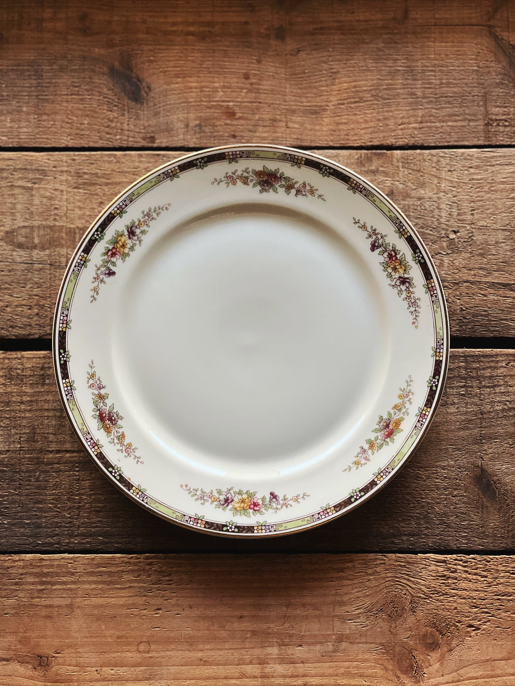 multicolor floral salad plate with black accents