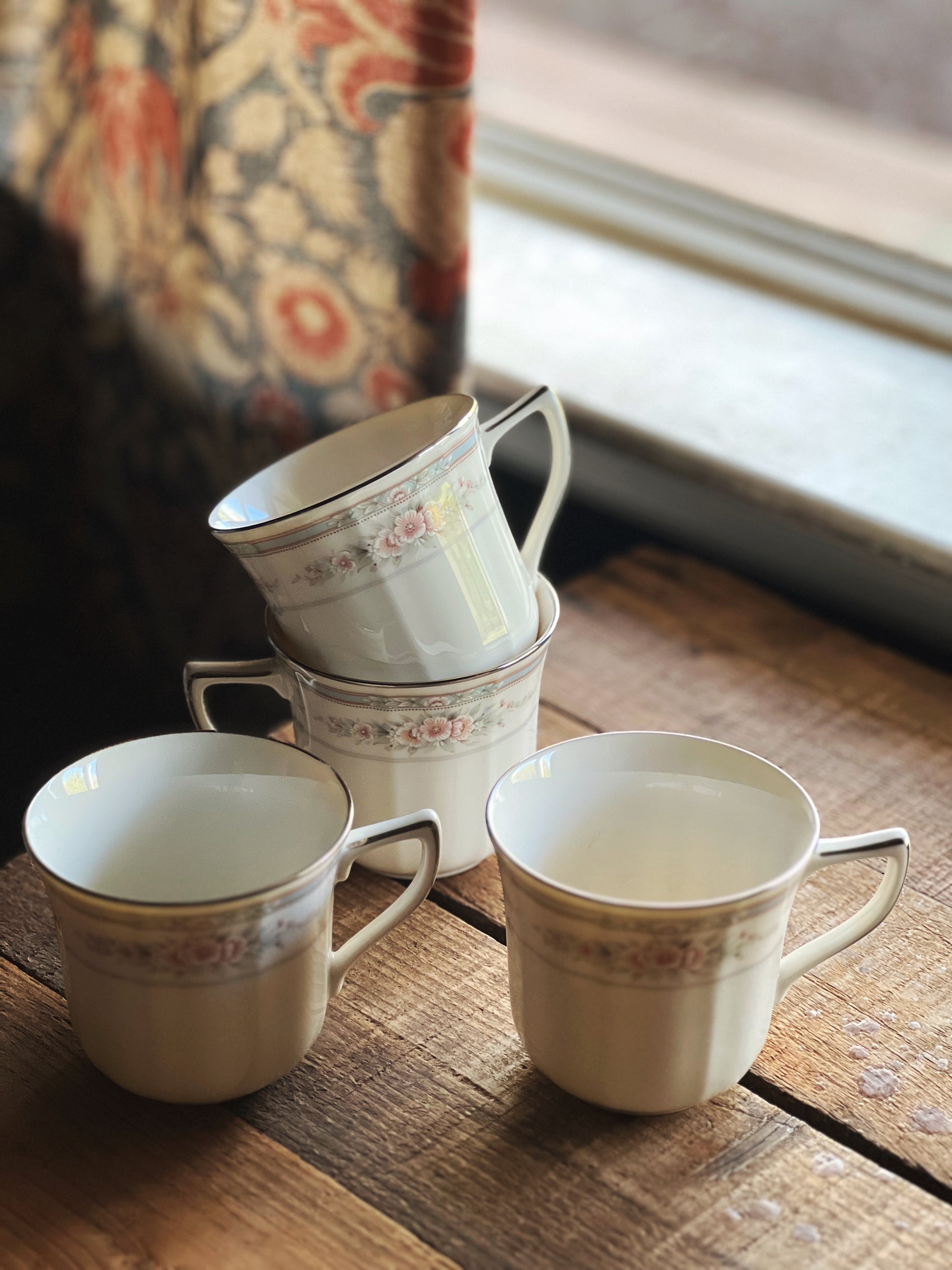 pink and blue floral teacups