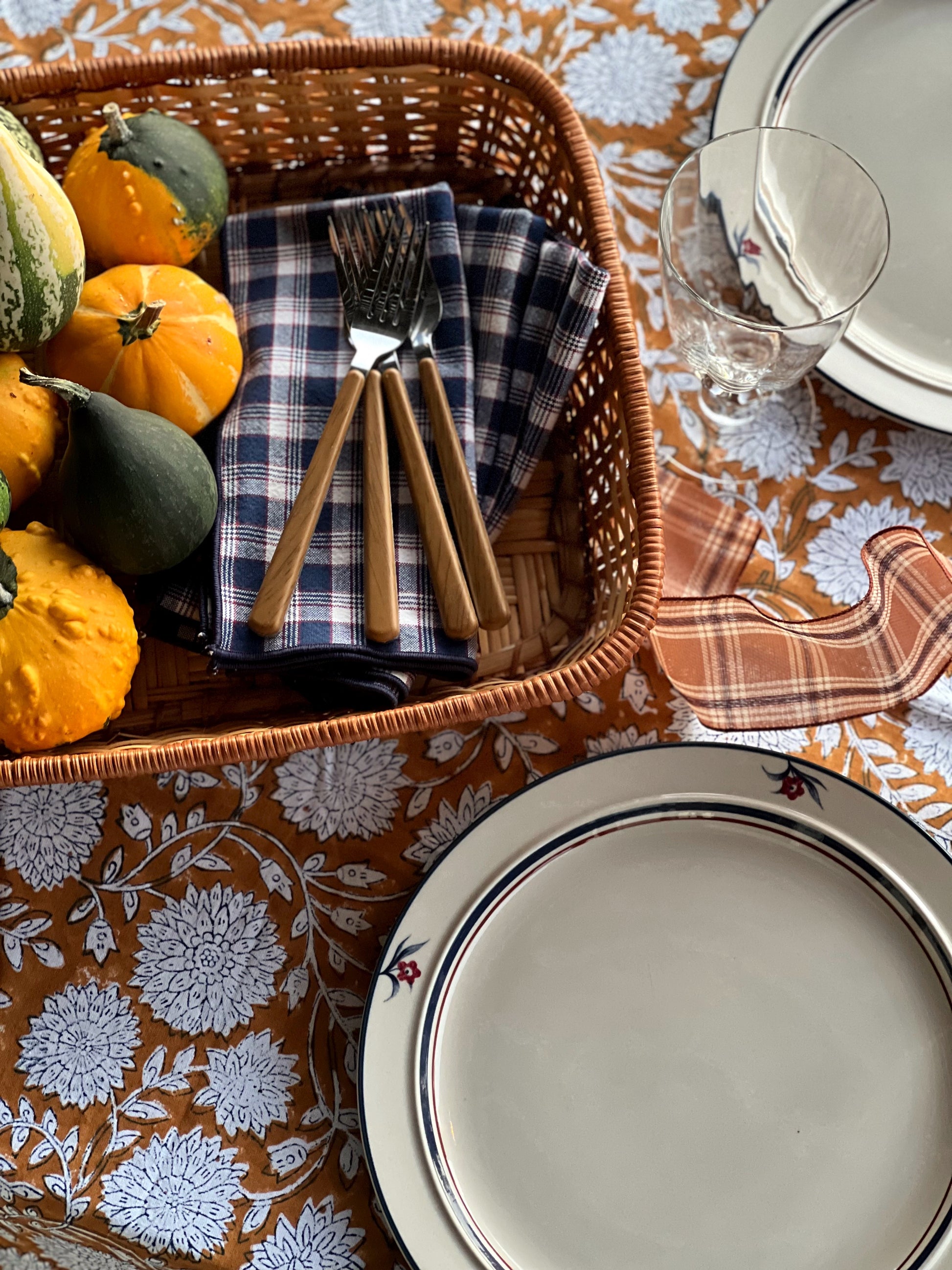 vintage dinner plates on an autumn table