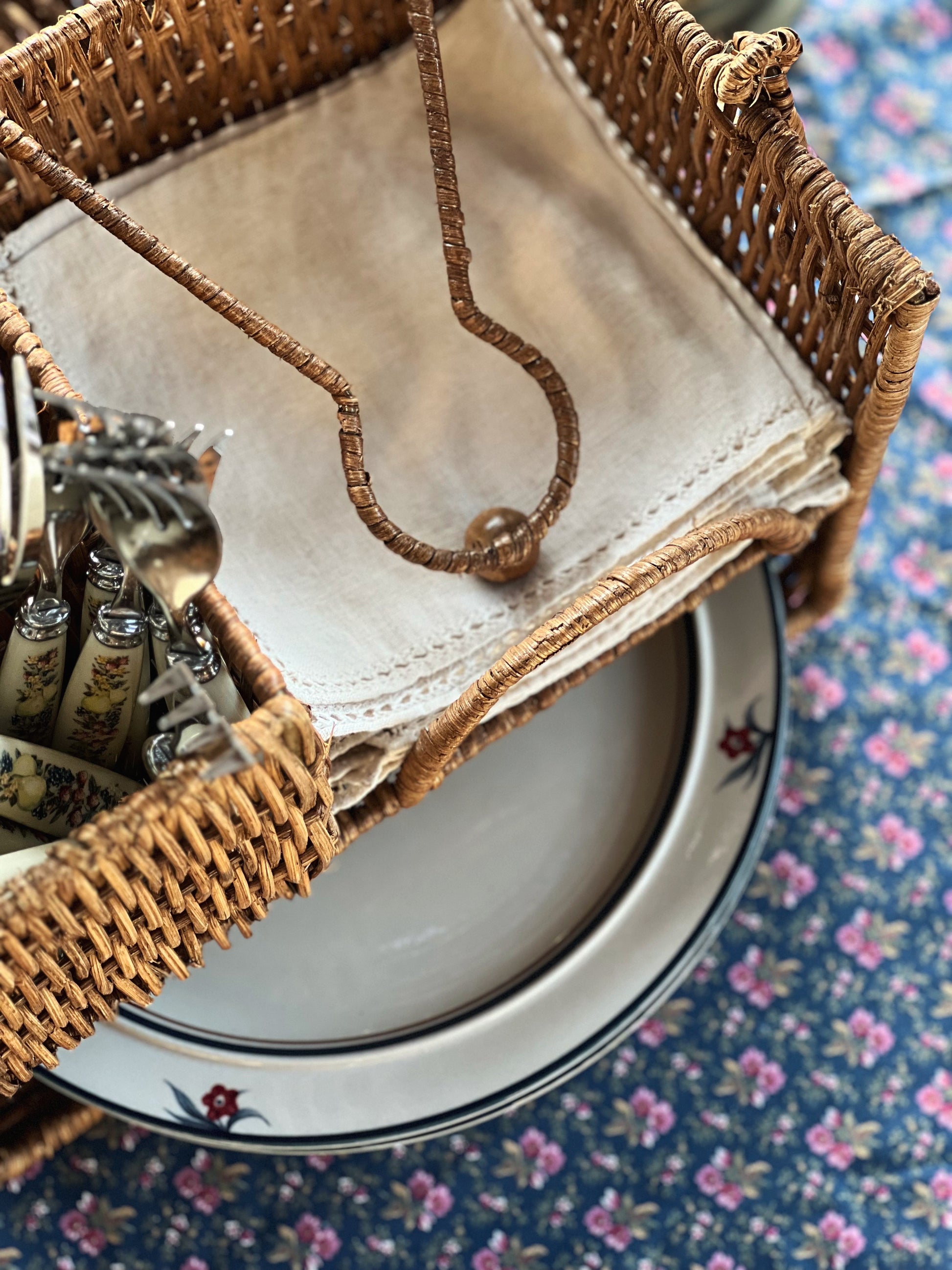 hemstitched linen napkins on an outdoor table