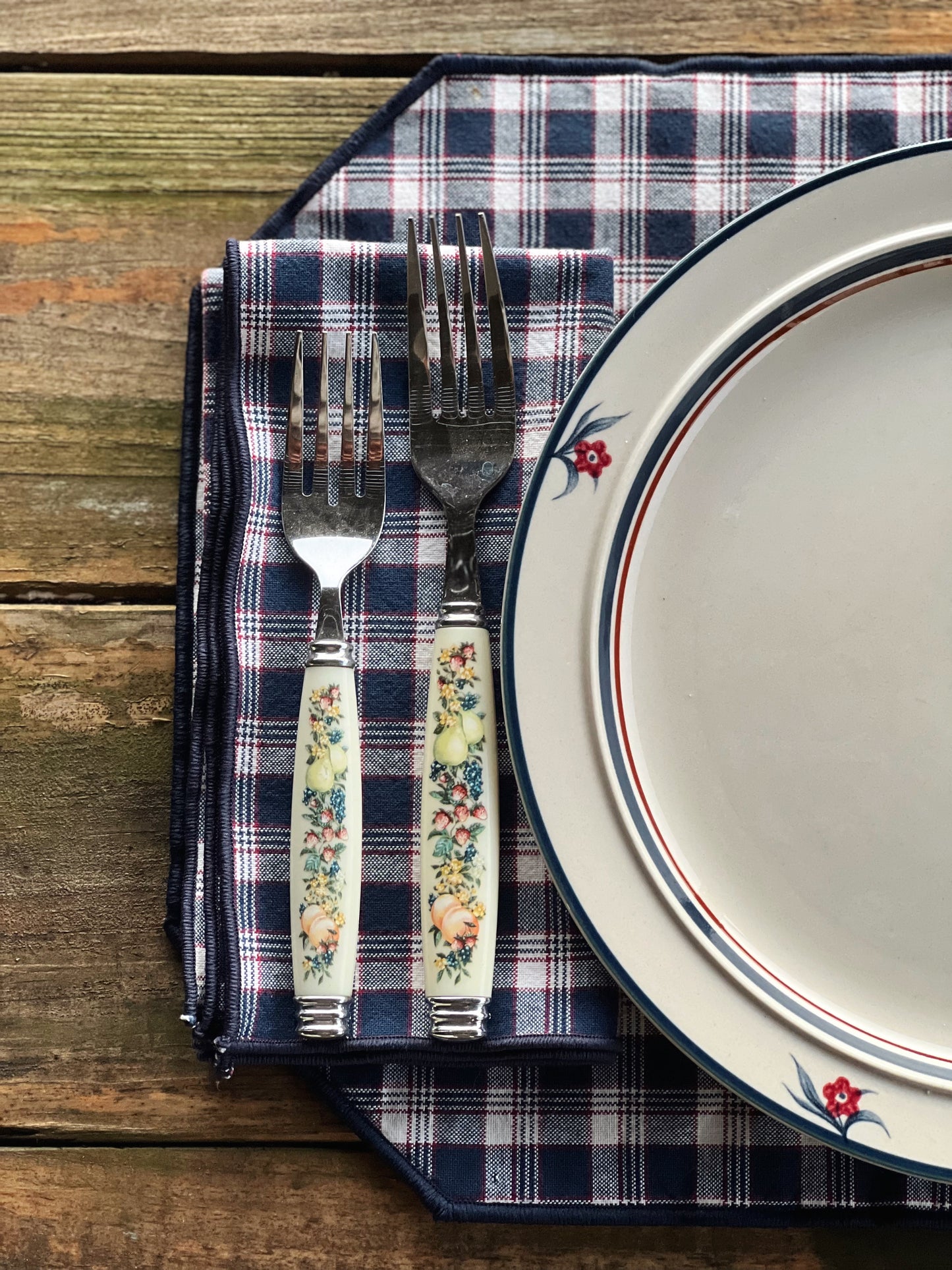 navy plaid placemat with vintage dinner plate and silverware