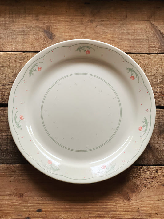Corelle dinner plate with a pink and green floral design
