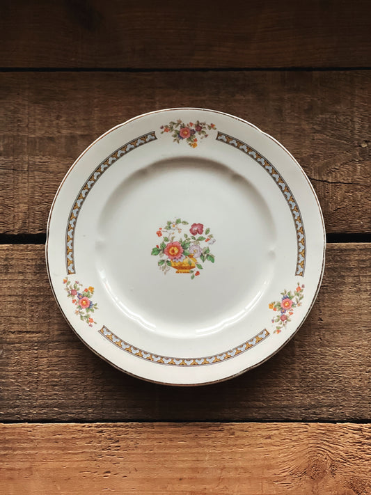 multi color floral plate in pink, blue and green