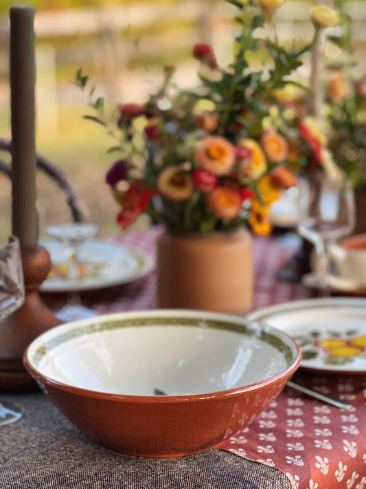 large round serving bowl on a table outside in autumn