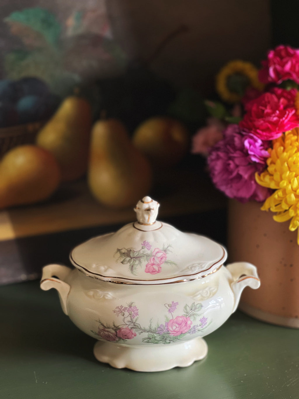 Vintage Homer Laughlin Virginia Rose covered sugar bowl with pink floral design styled with flowers and fruit