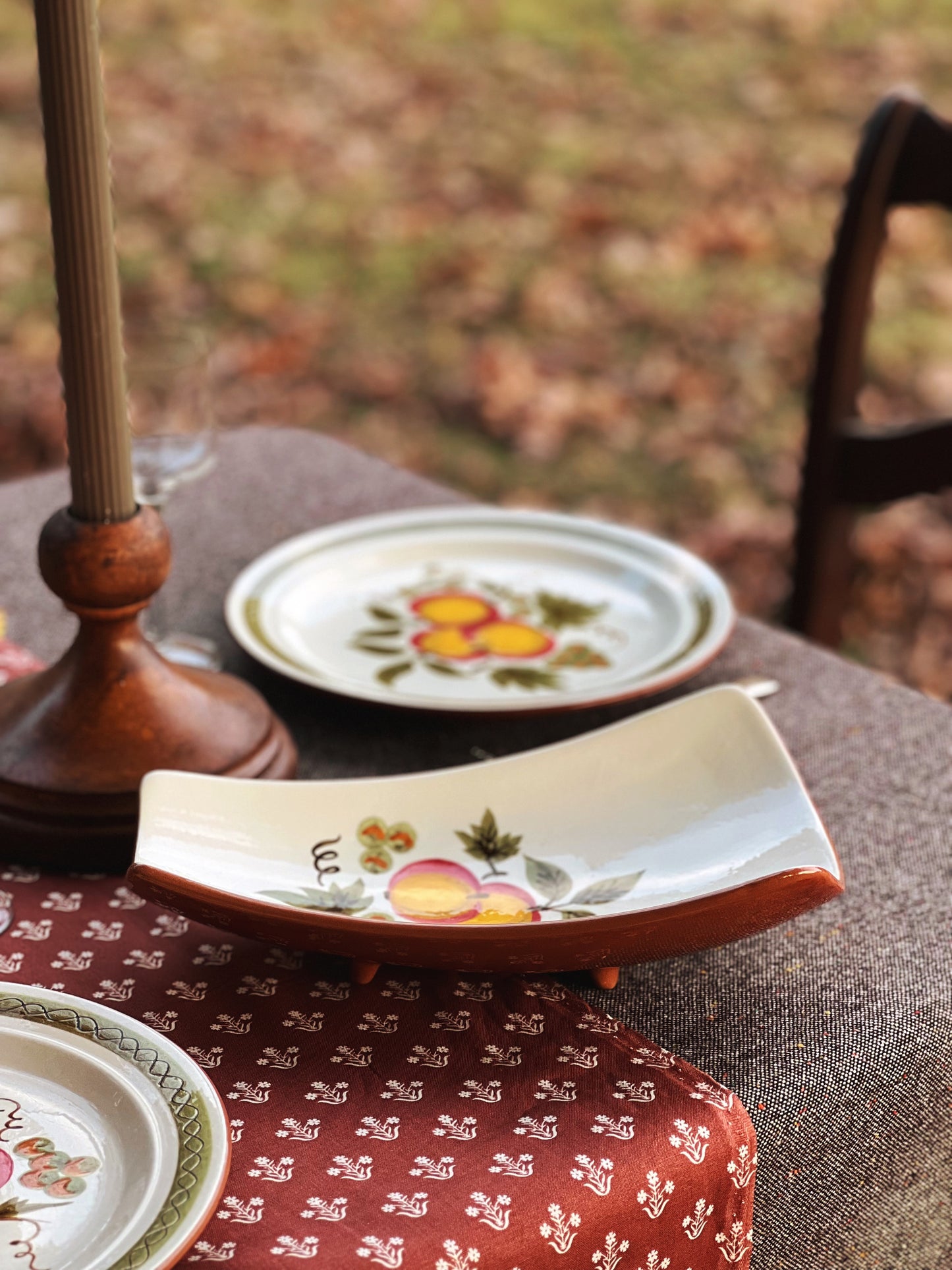 footed relish platter on a table outside in fall