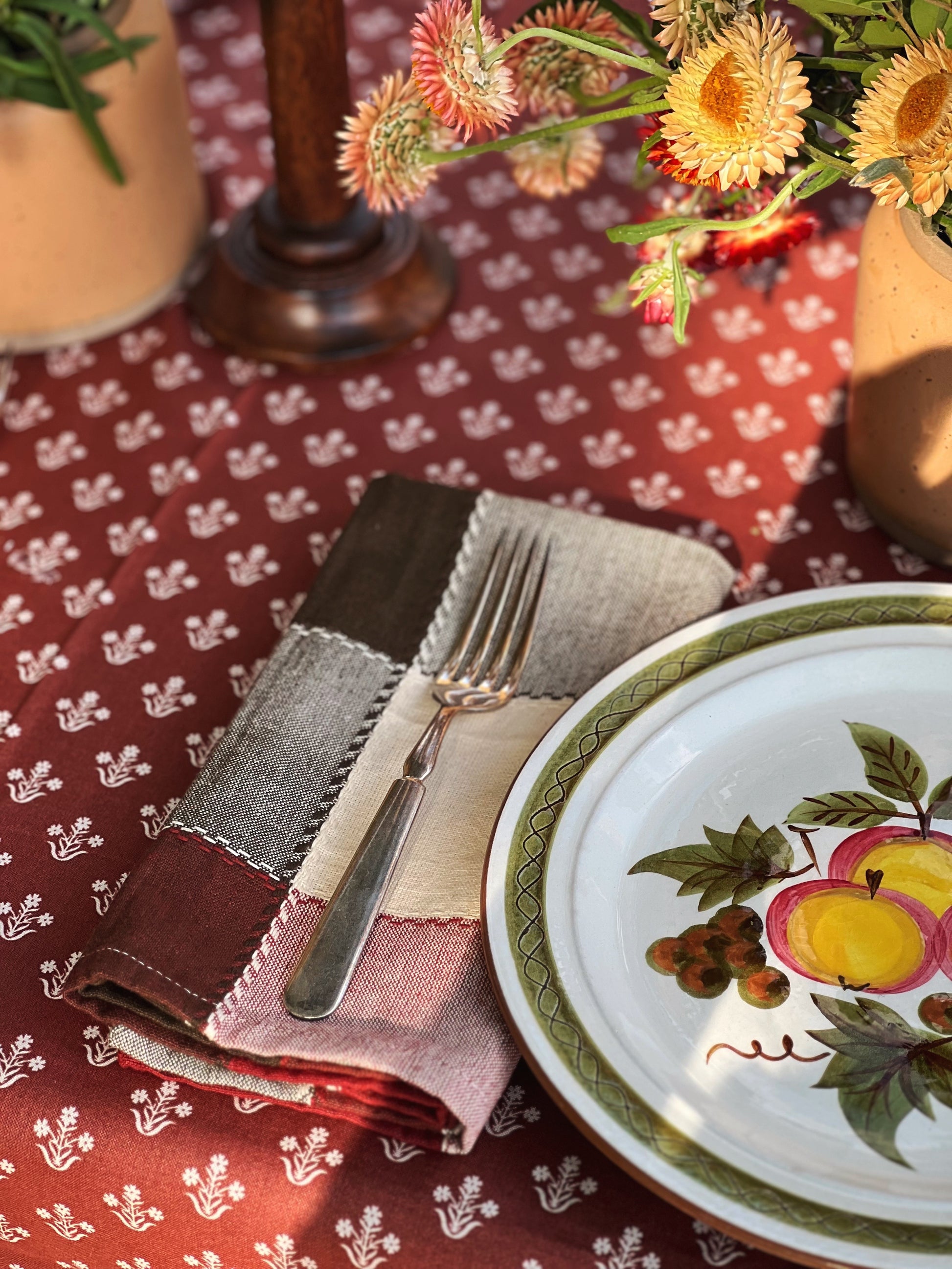 plaid napkin set on a table outside for fall