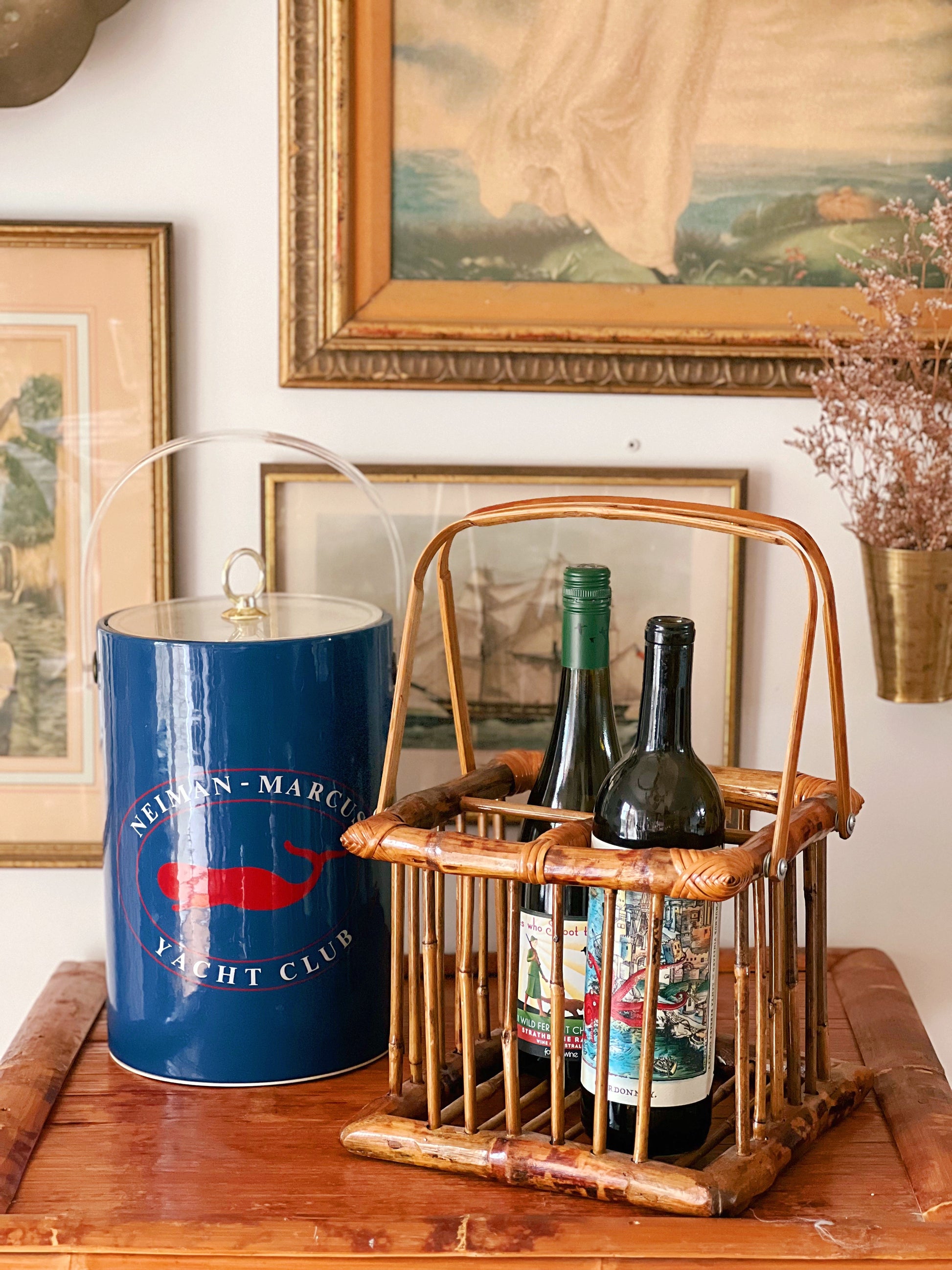bamboo wine bottle carrier on a table with an ice bucket