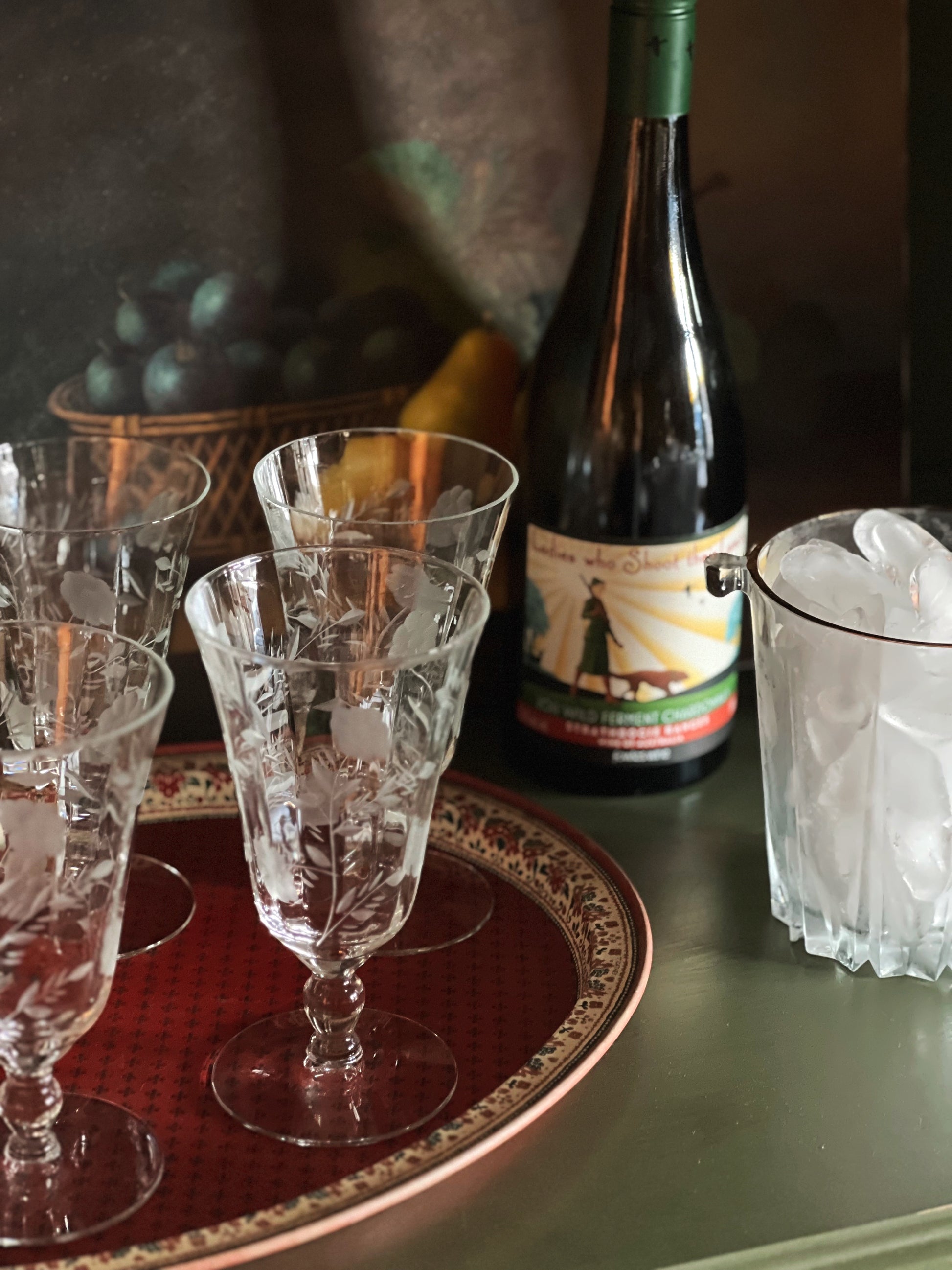 etched iced tea glasses on a tray