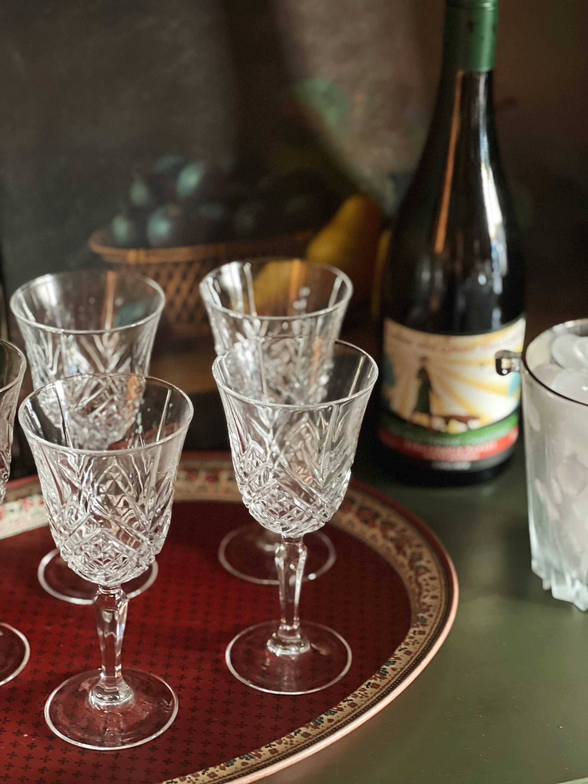 cut crystal wine glasses with a beveled stem on a tray