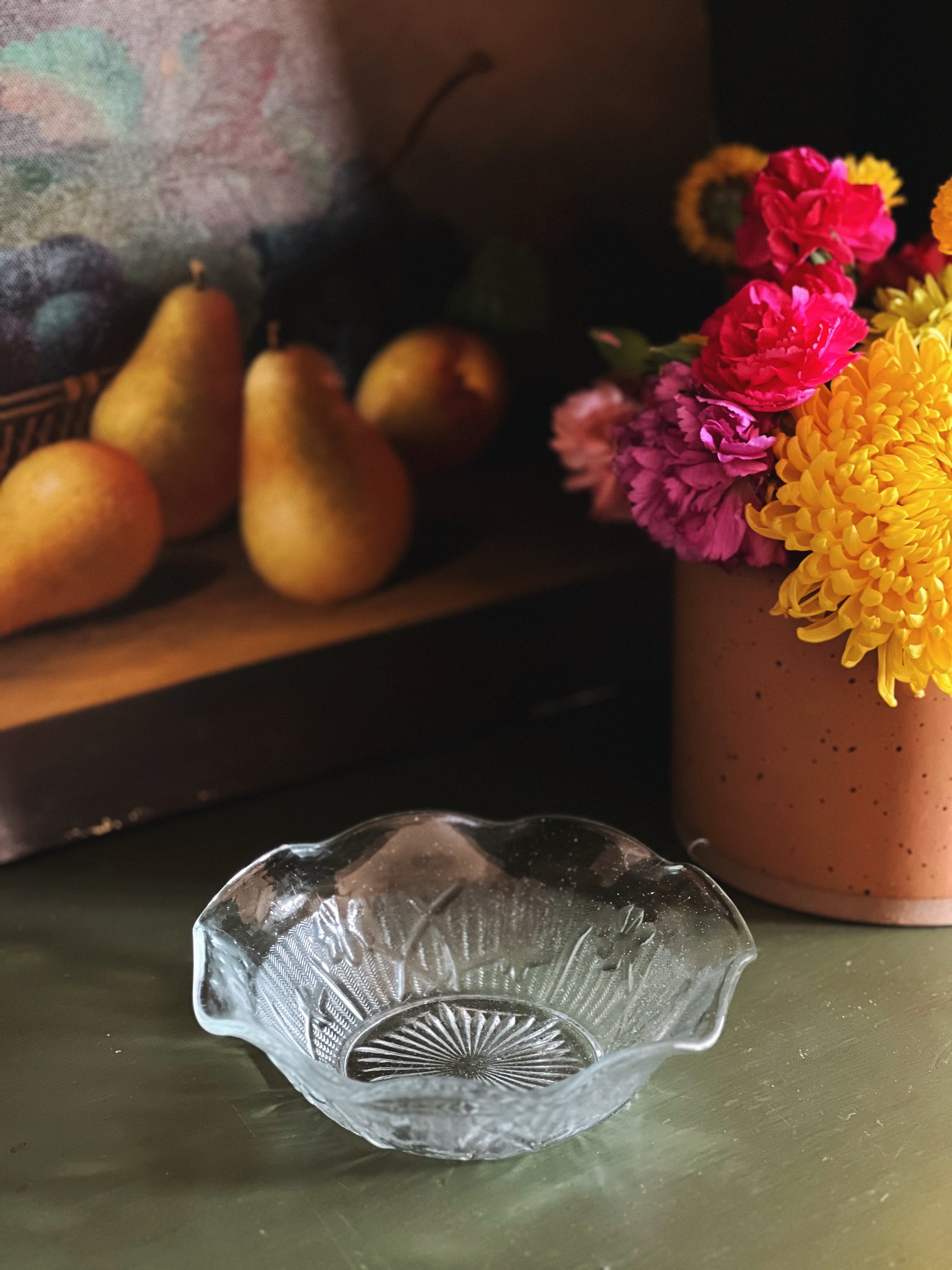 small glass bowl with a ruffled rim