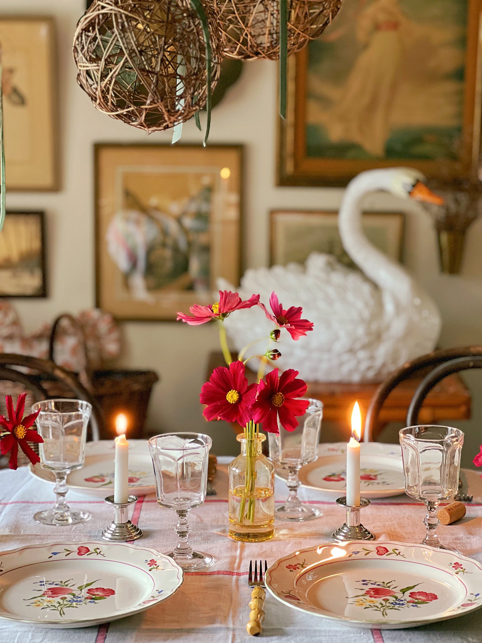 yellow glass bud vases set on a dinner table