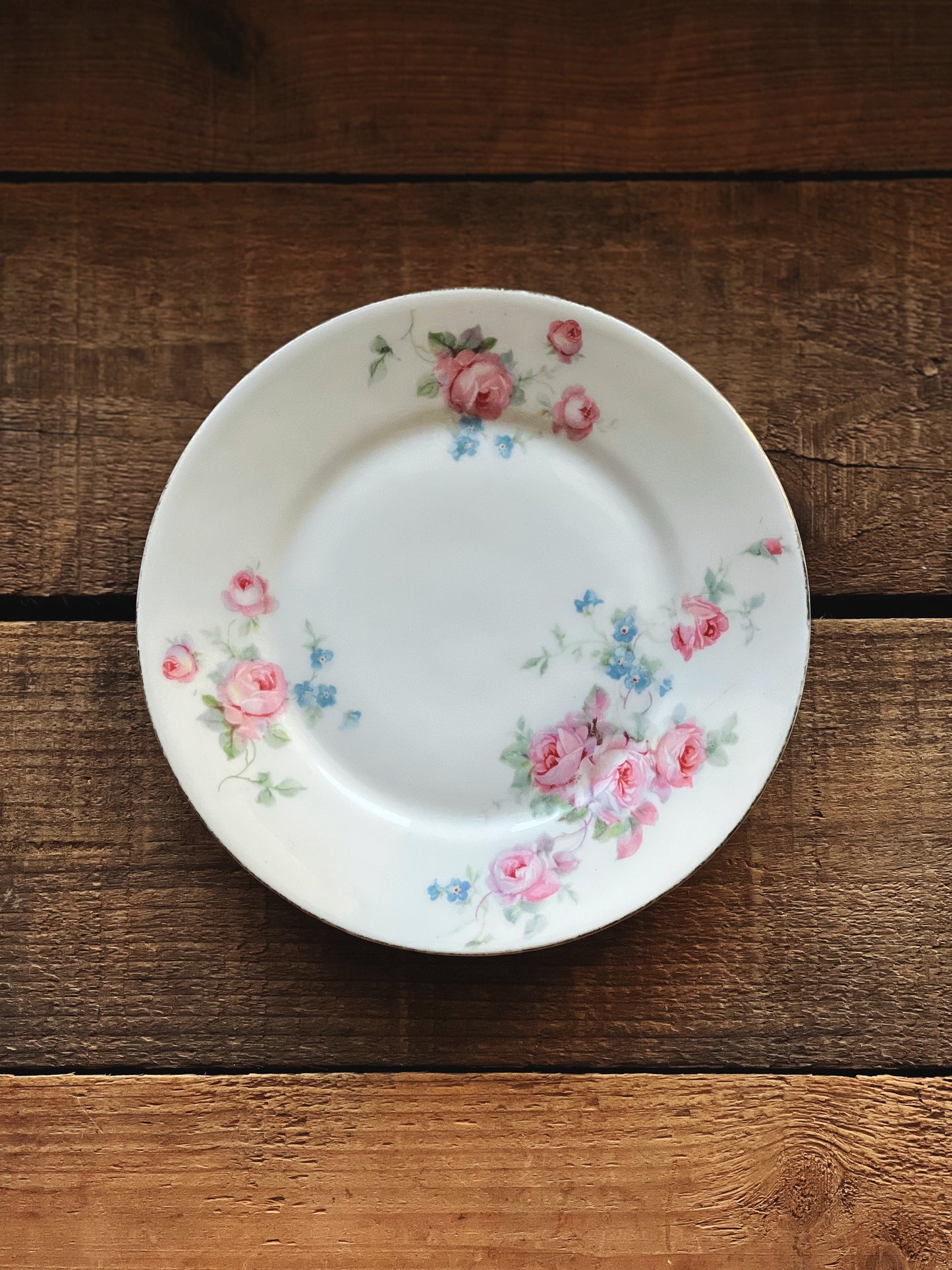 pink and blue floral dessert plate