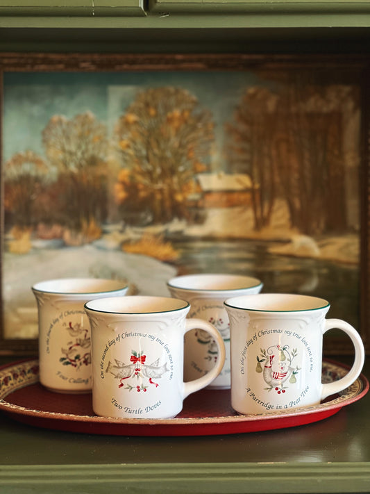 set of 4 vintage Christmas mugs depicting the first four days of Christmas