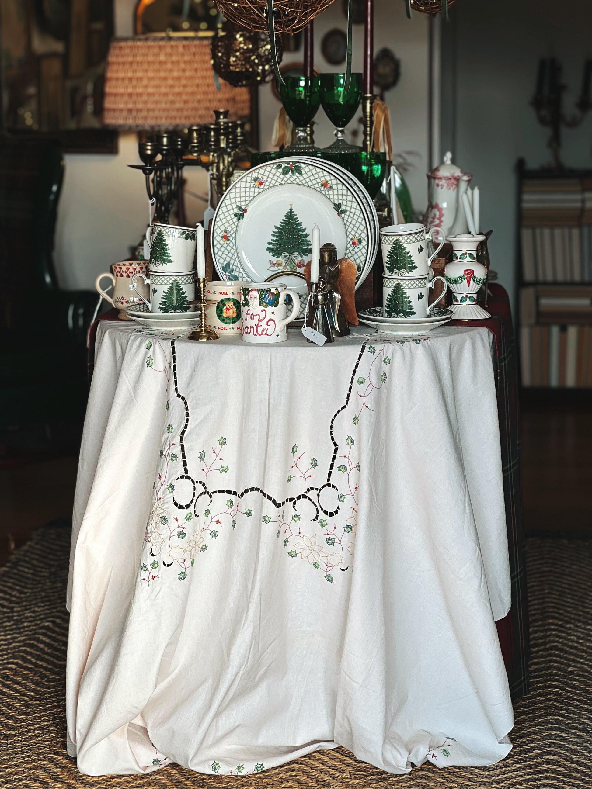 embroidered Christmas tablecloth on a table