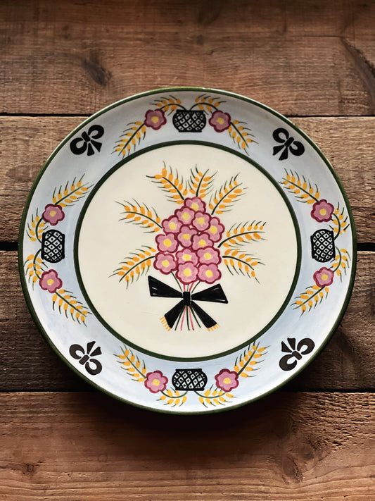 Henriot Quimper plate with black bows and flowers