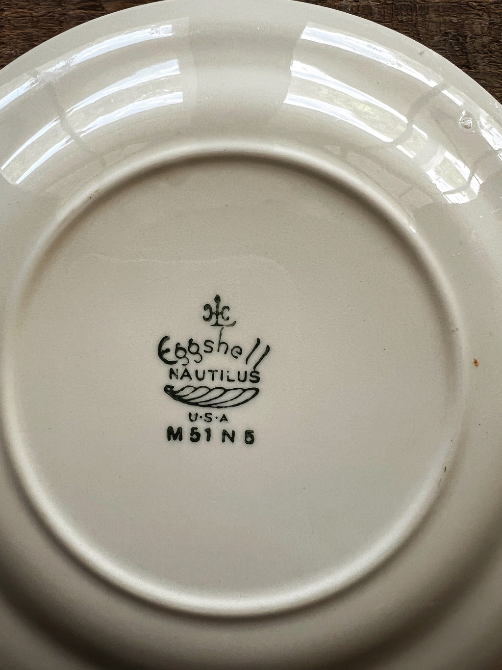 Close up of  backstamp on vintage Eggshell Nautilus china plate