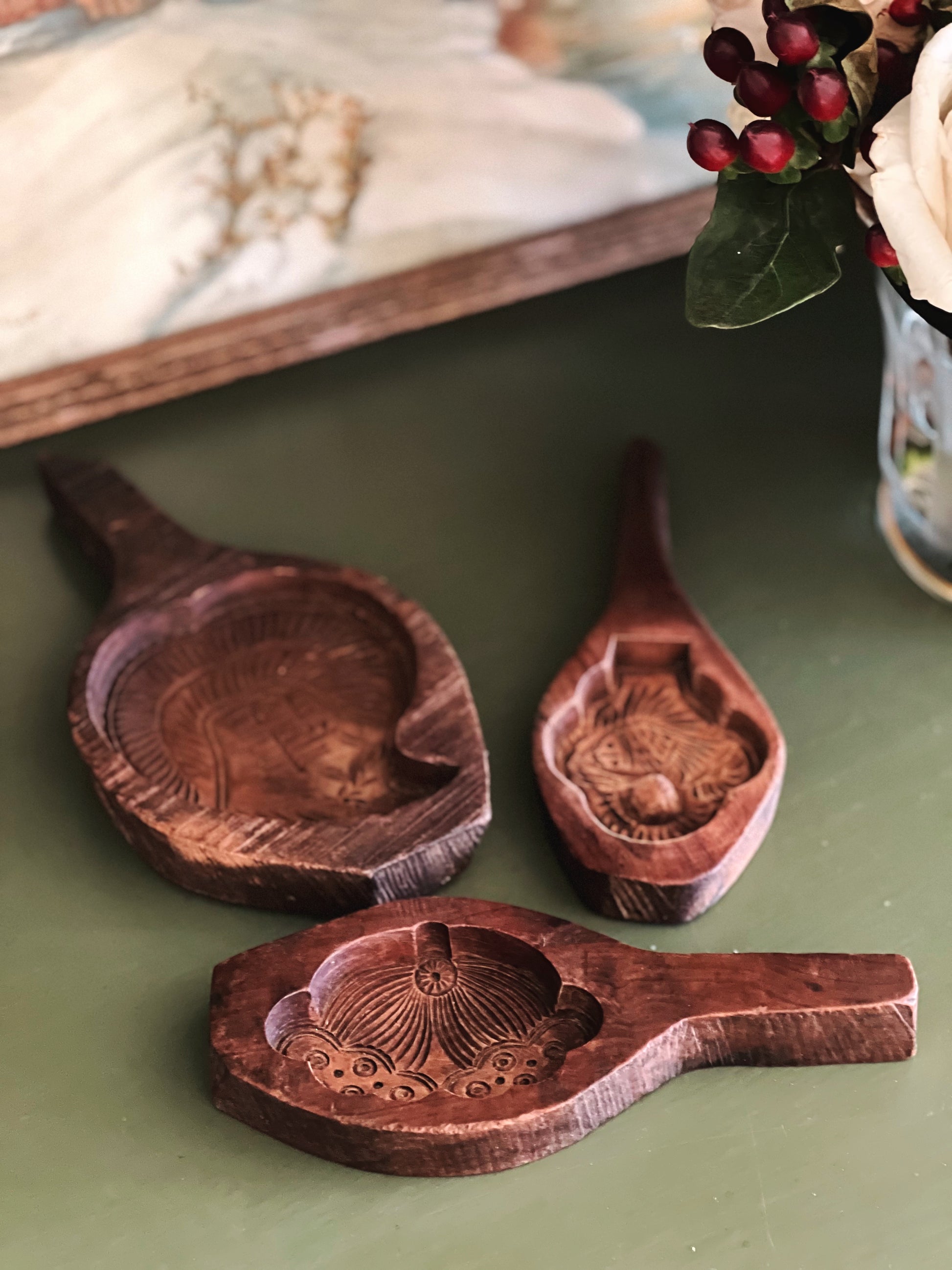 three antique wooden butter molds