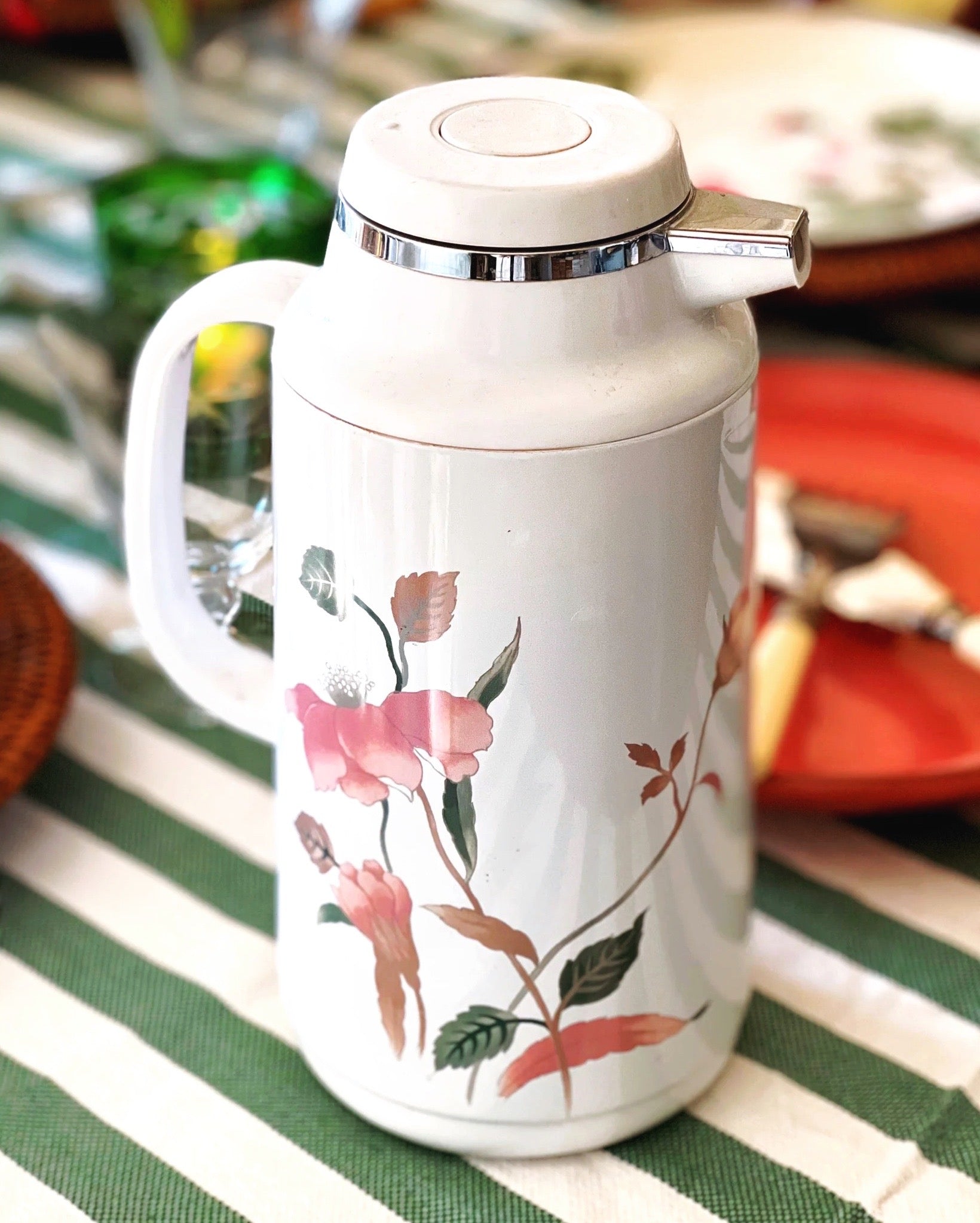 insulated carafe with pink and green floral design