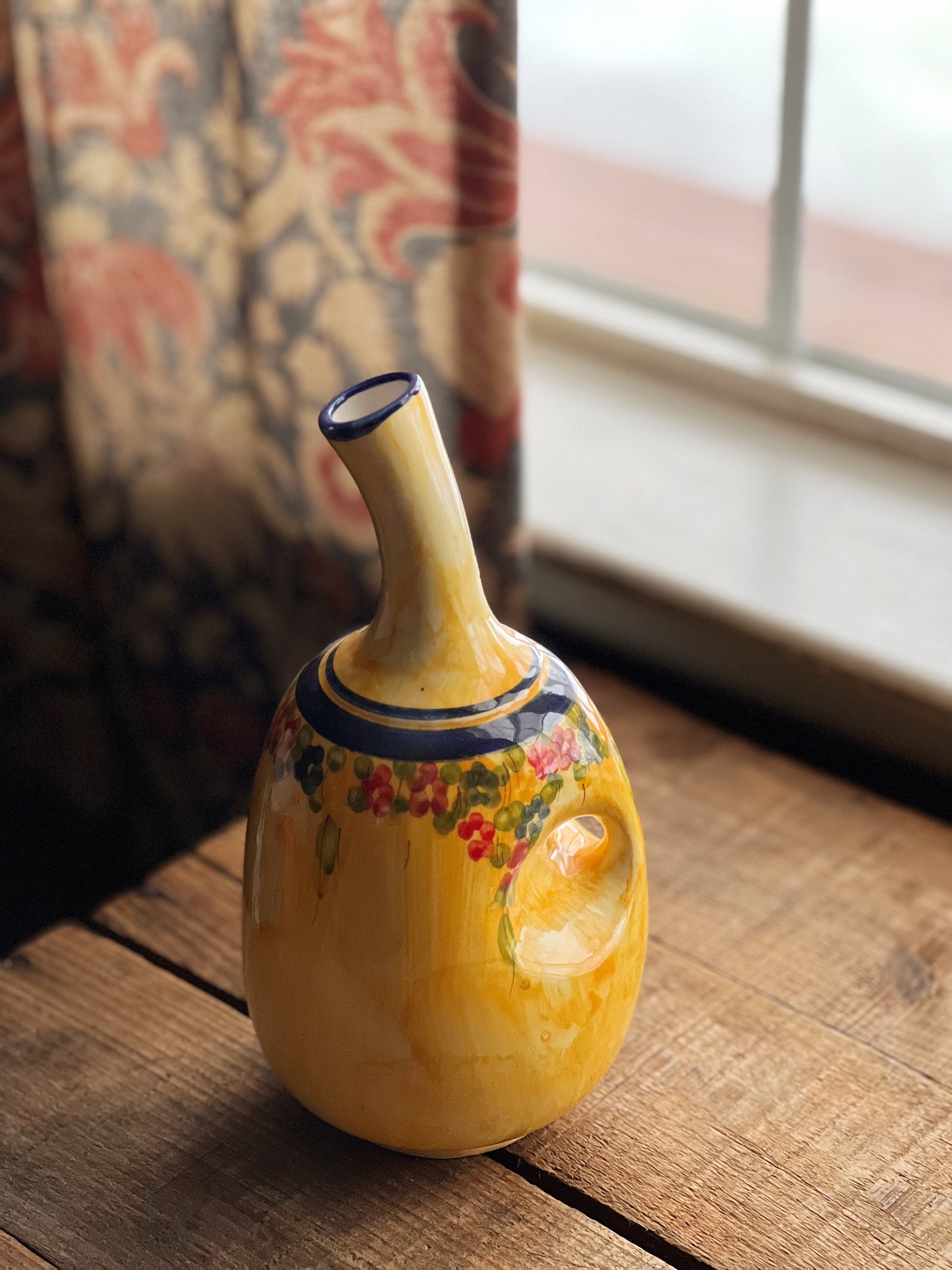 hand painted yellow and navy oil bottle