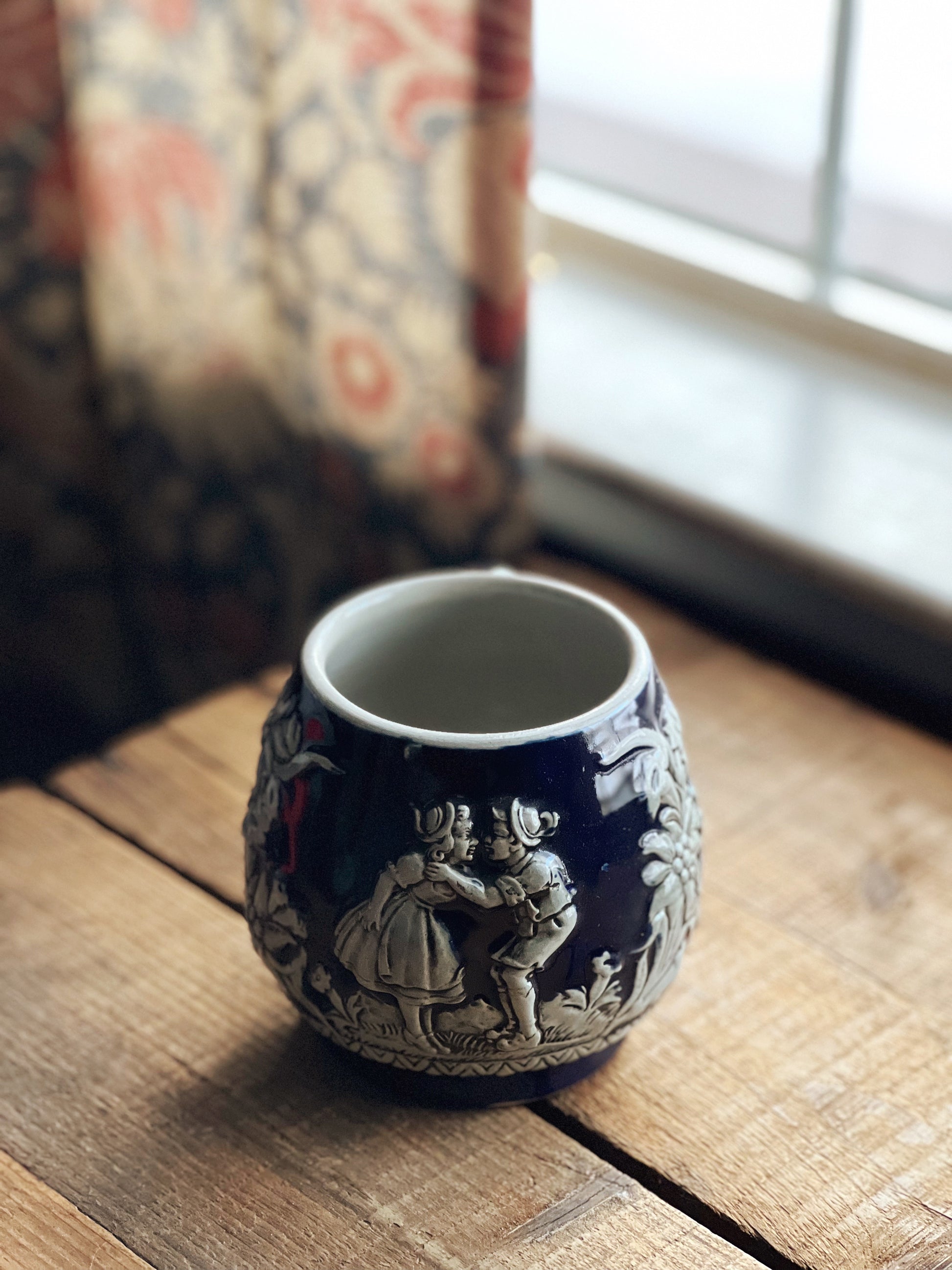 German mug with an embossed design