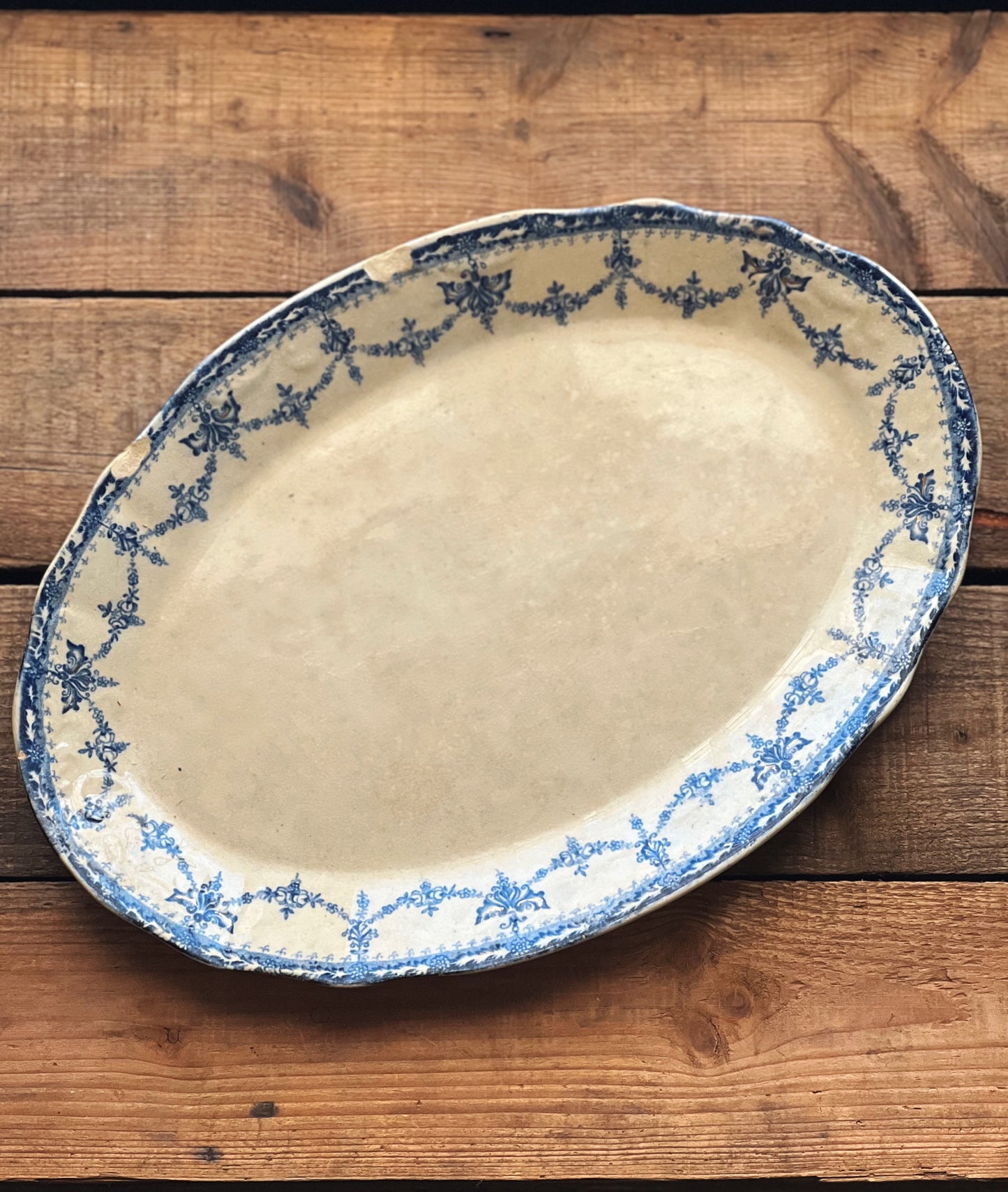 oval antique flow blue platter