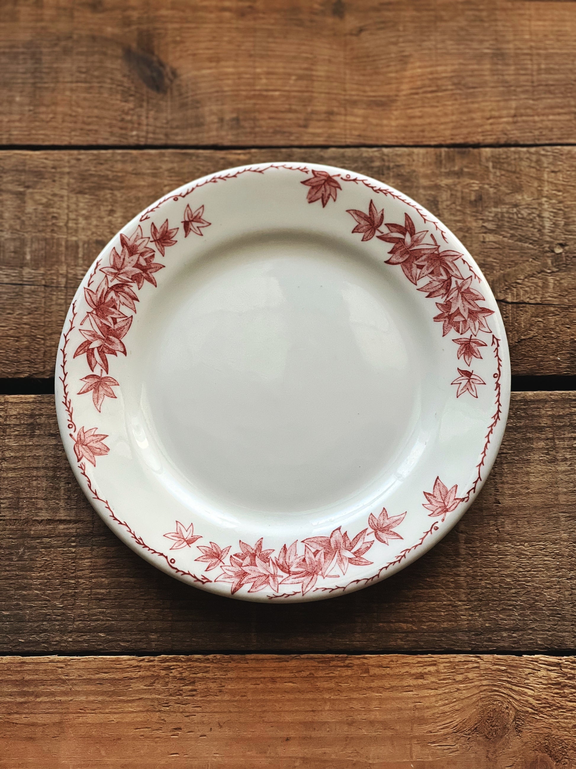 red and white floral salad plate