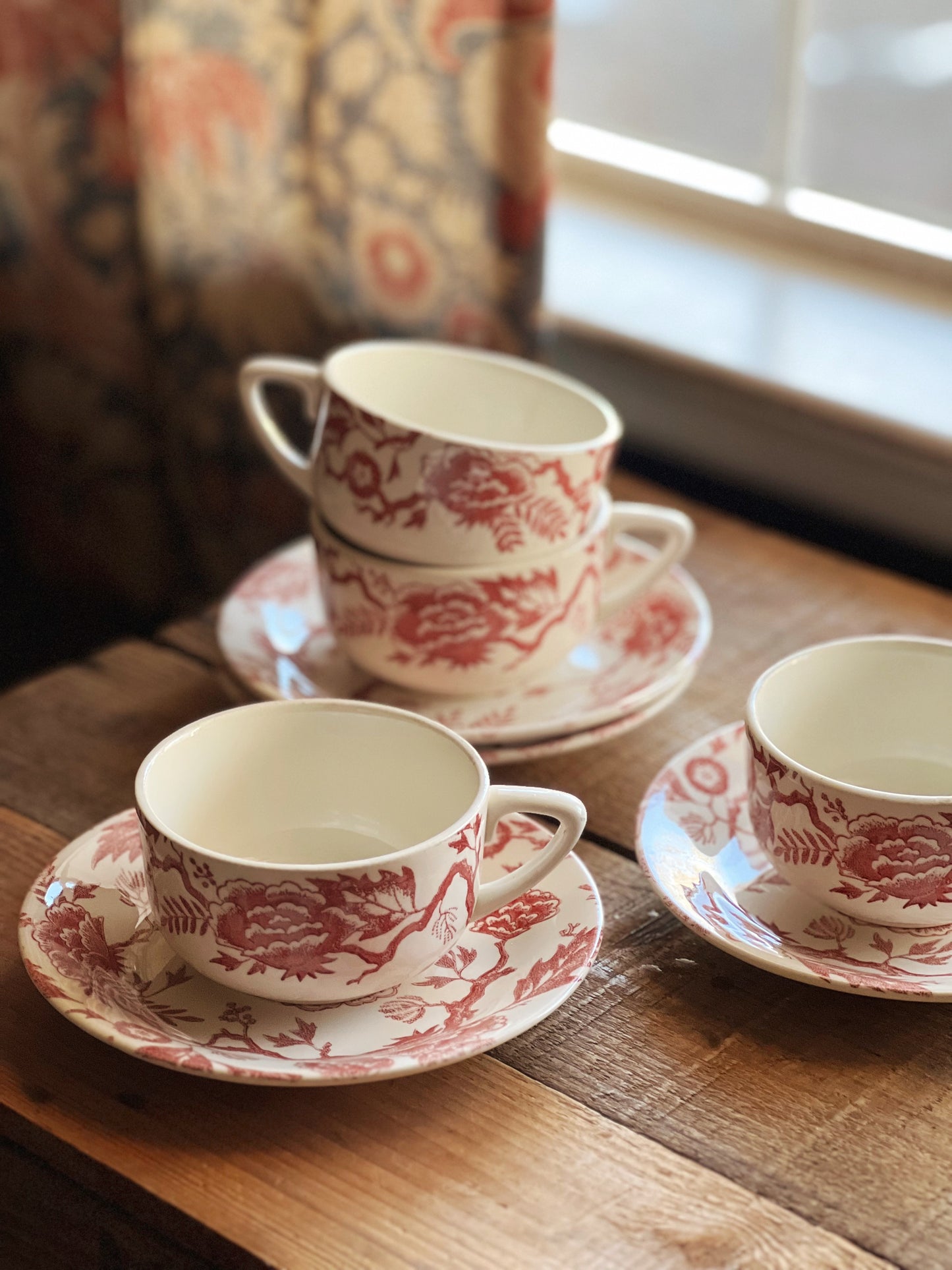 pink transferware teacup and saucer set