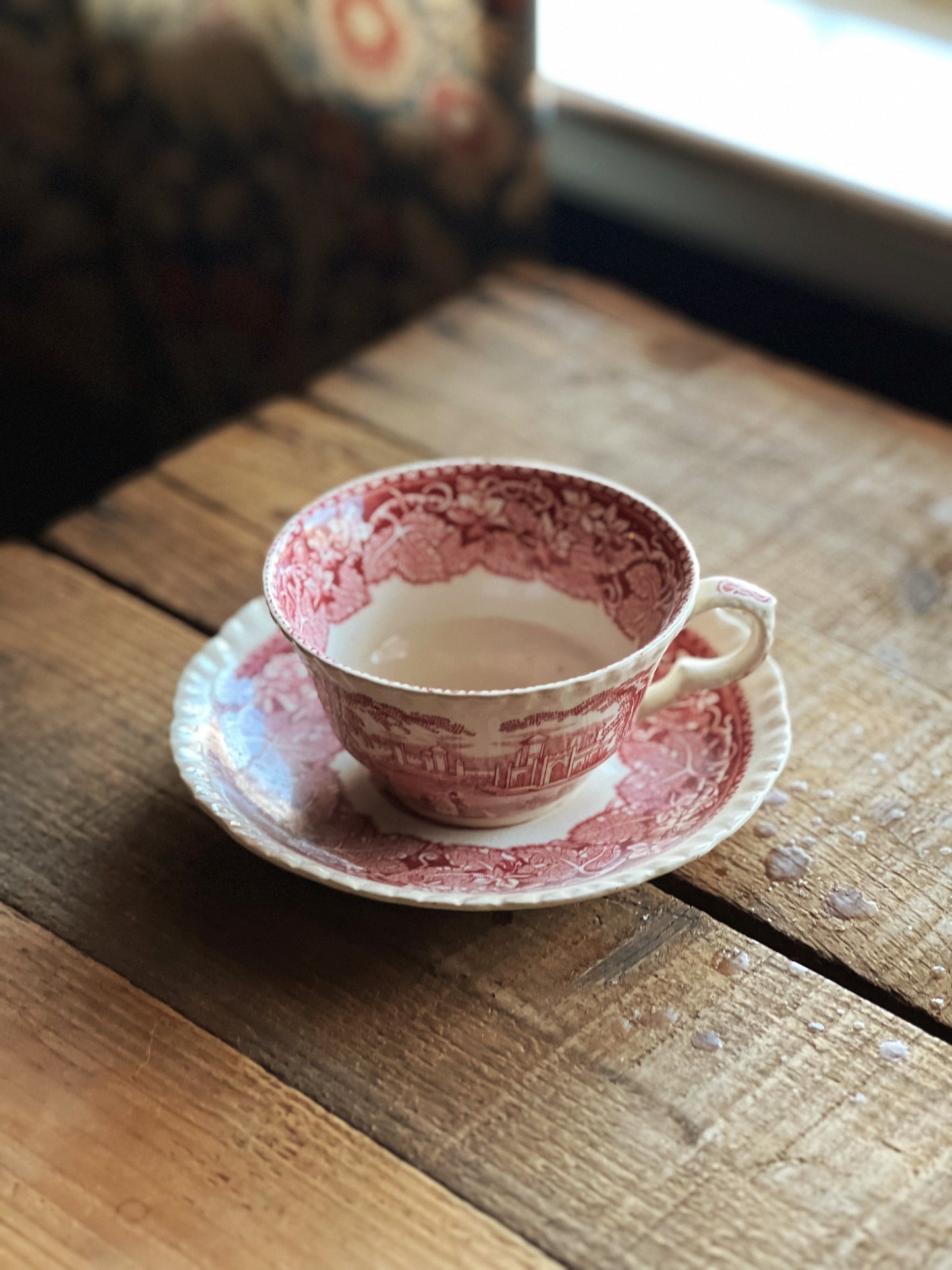 pink transferware teacup and saucer set