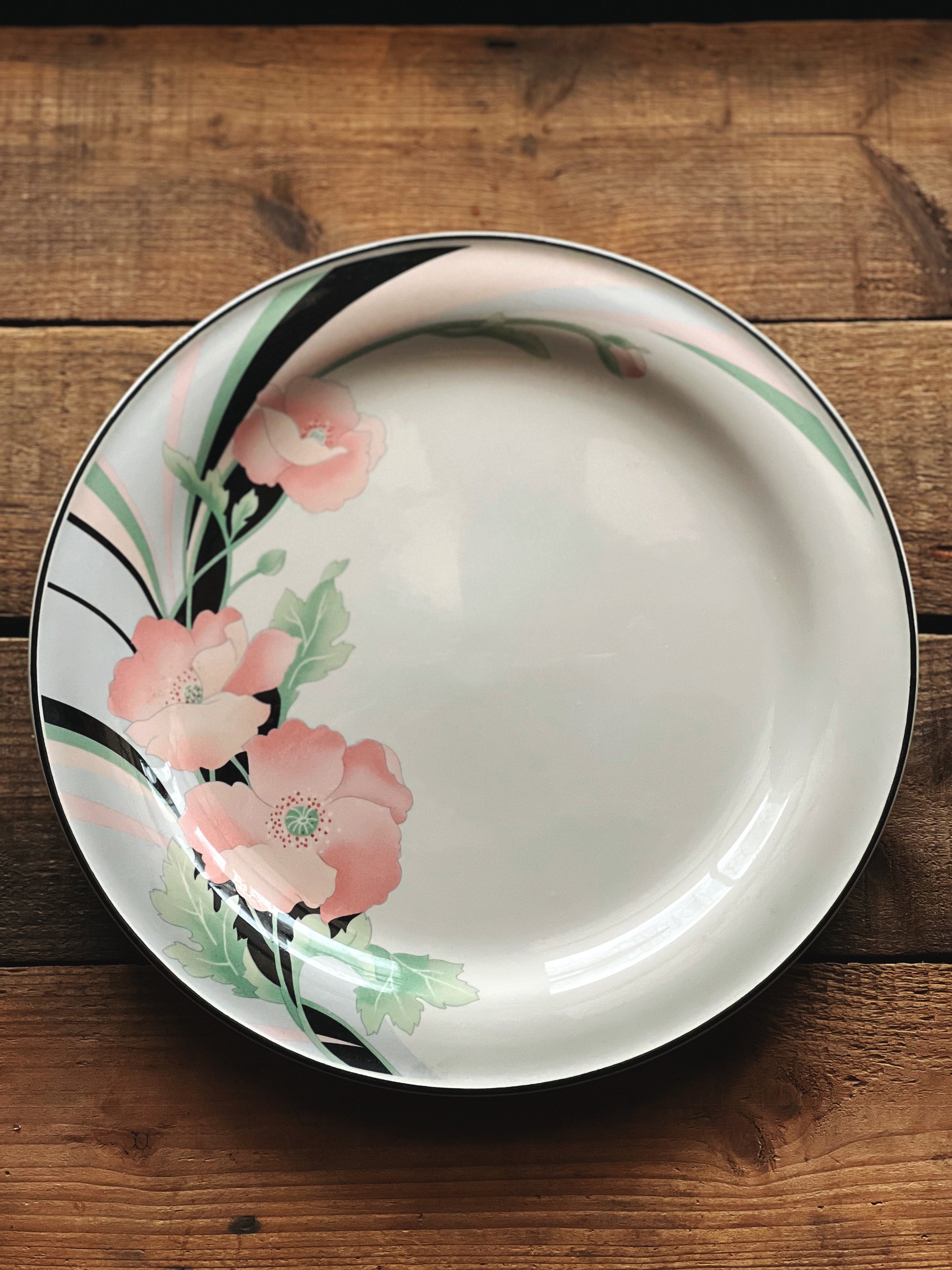 pink green and black floral dinner plates