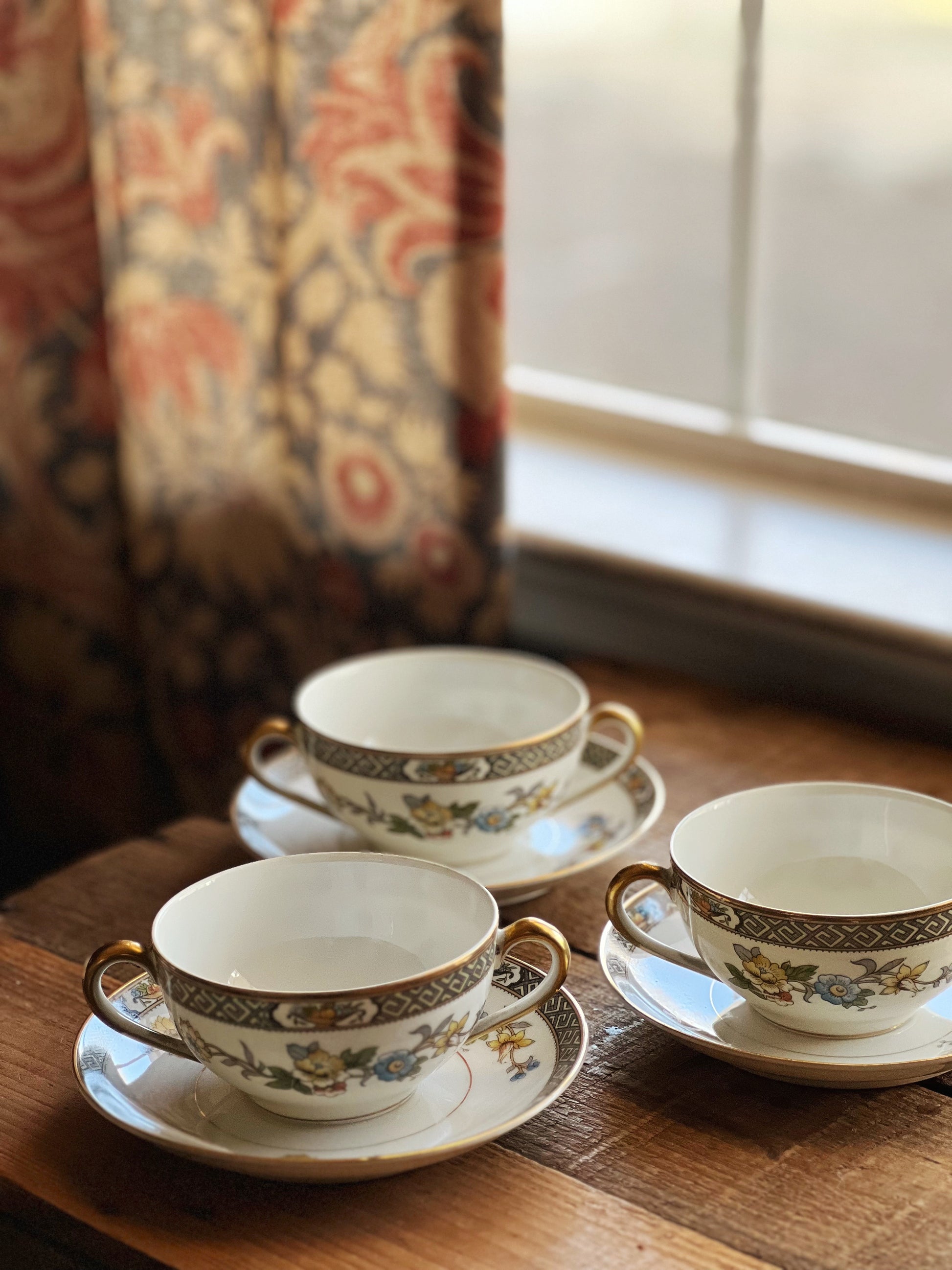 double handle teacup and saucer set